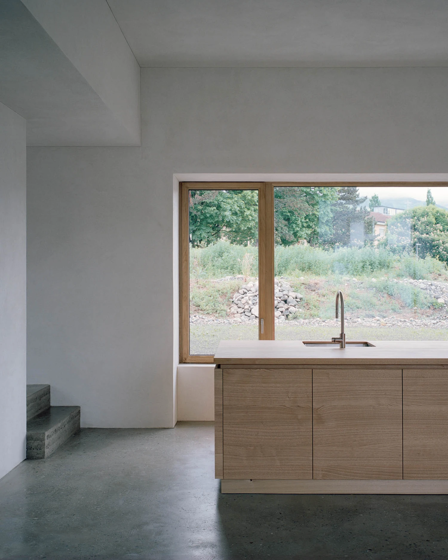 The Gässli5 by allen + crippa architektur in Werdenberg Switzerland, rammed-earth and historic log house with permaculture garden, sustainable circular architecture