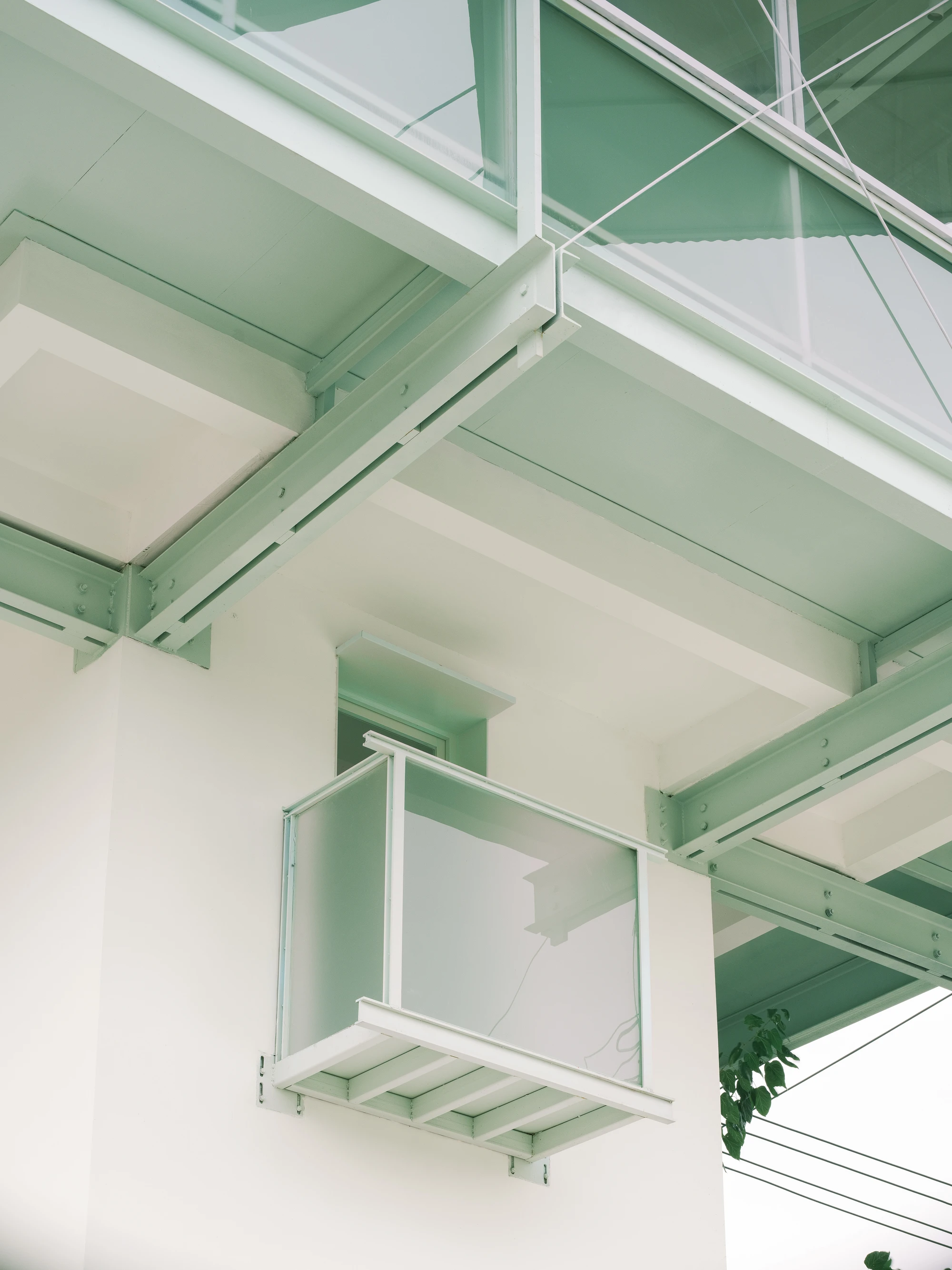 A Very Small 24-hour Bookstore by SZ-Architects in Hefei China, adaptive reuse guard tower converted to public reading space, suspended steel structure with four-leaf clover roof