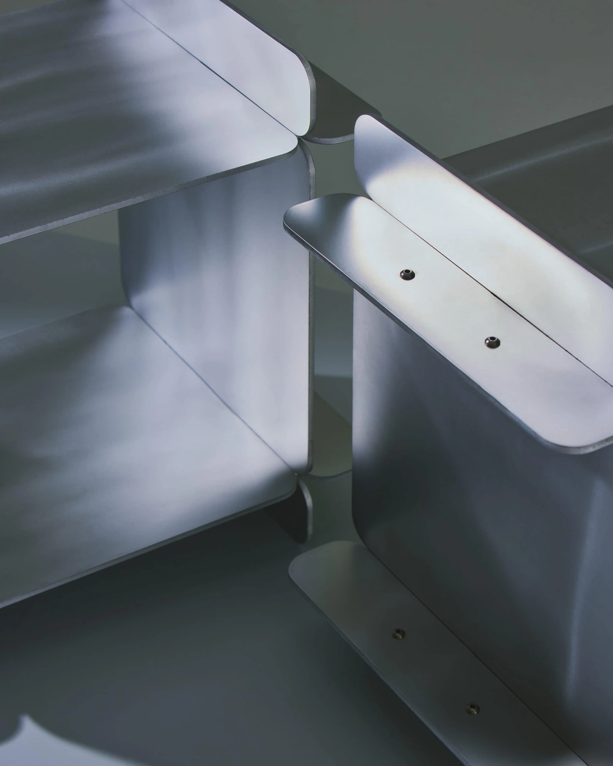 LESORR furniture design by David Raymond in Quebec Canada, raw aluminium objects from Rounded Edges Collection, slowness as design methodology featured in C41 Magazine