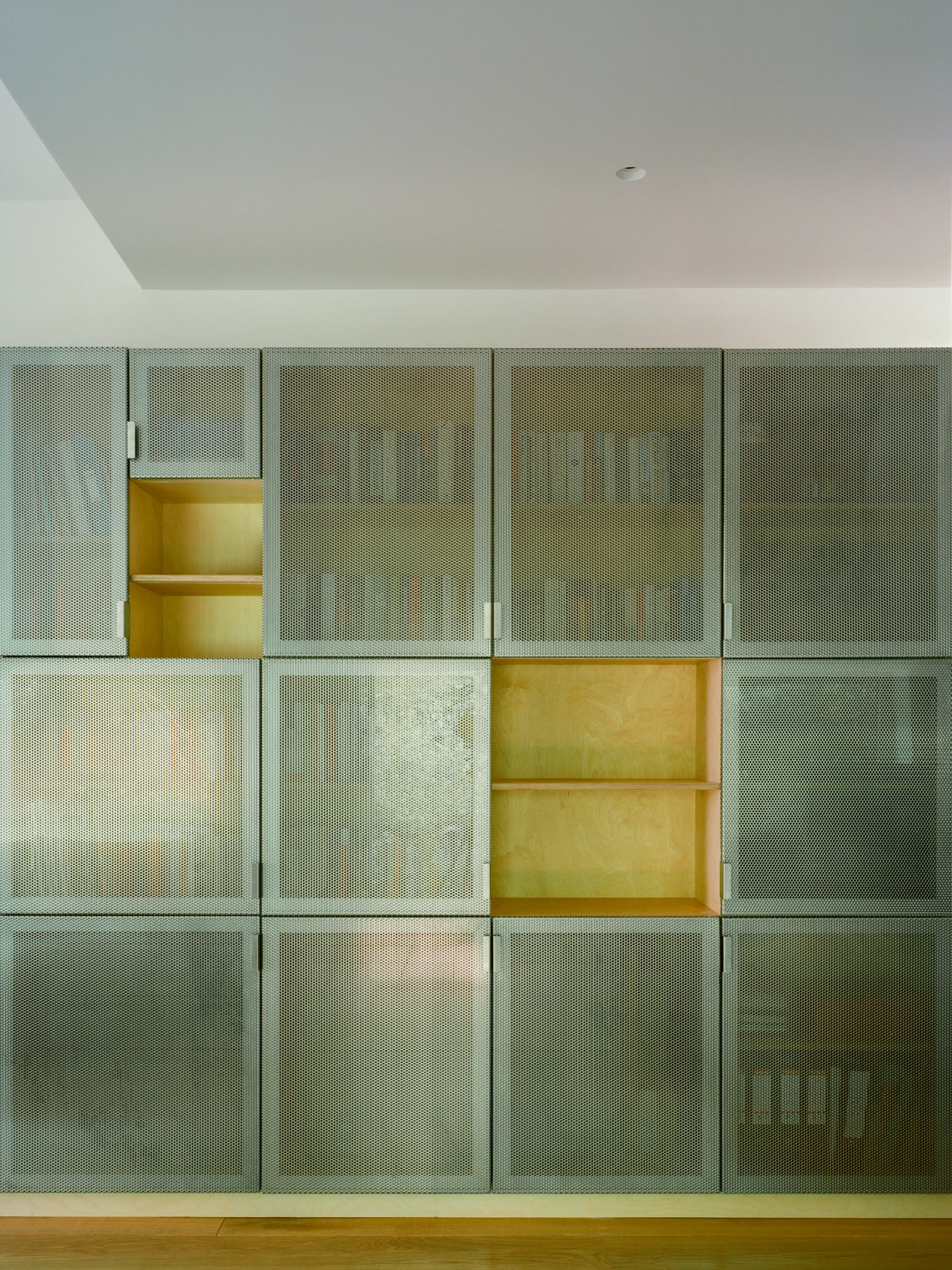 Exeter Road Pavilion by Neiheiser Argyros in London UK, adaptive reuse Victorian outbuilding with perforated stainless steel cabinet marble counterweight and Fischli Weiss inspired structural precarity