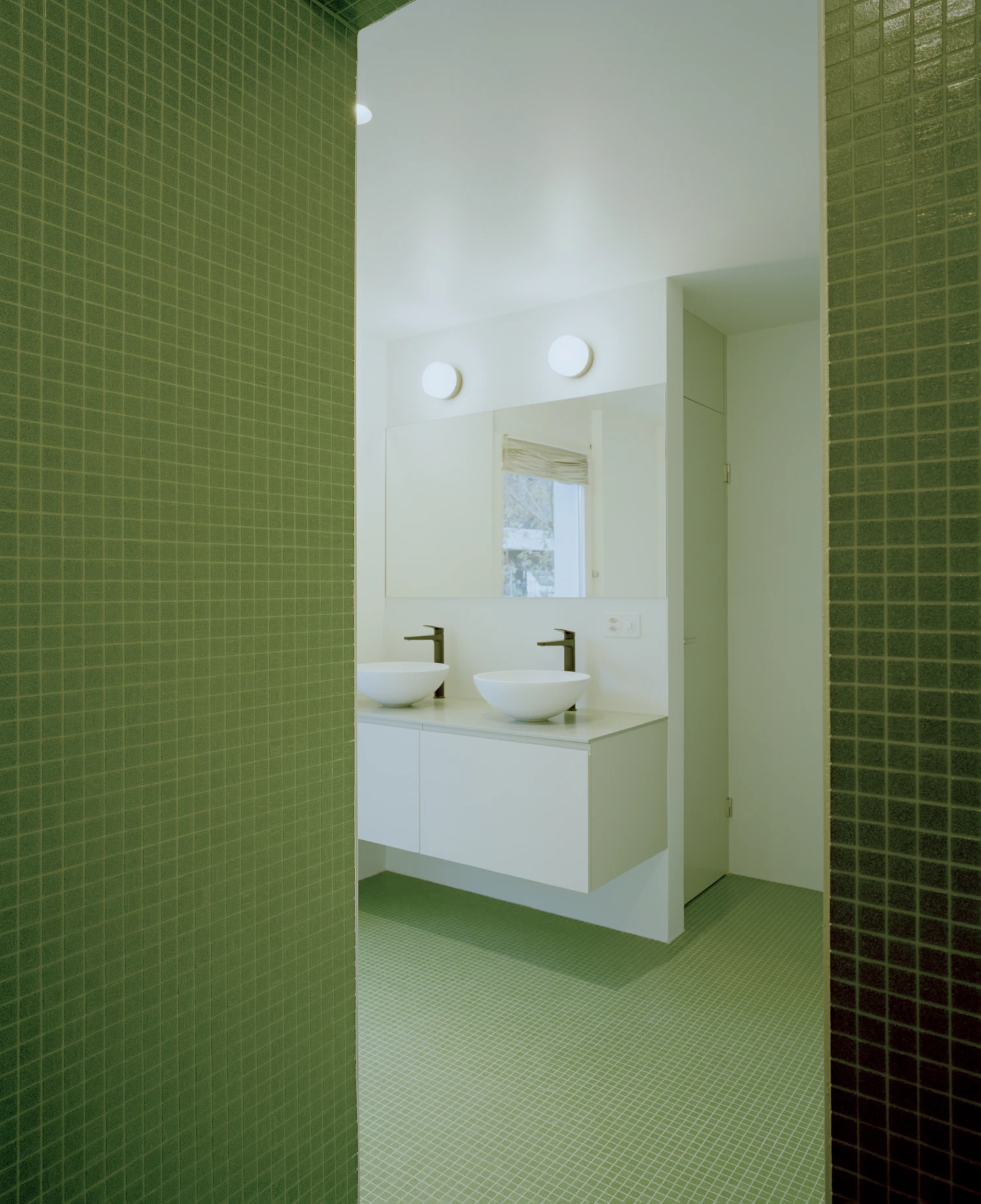 Kirschbaumweg renovation by Staehelin Meyer Architektur in Bottmingen Basel Switzerland, 1990s house with timber upper floor pink green colour scheme spiral staircase and lounger net