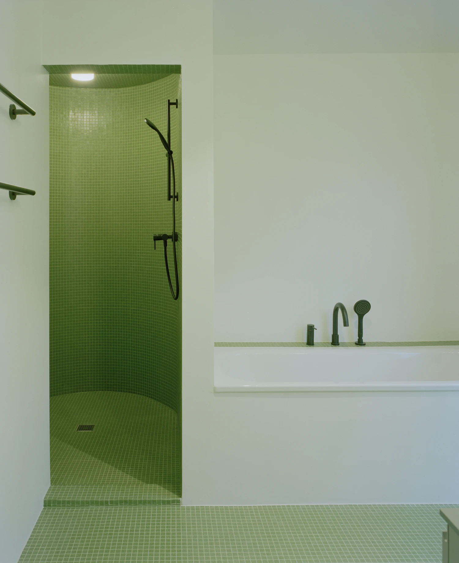 Kirschbaumweg renovation by Staehelin Meyer Architektur in Bottmingen Basel Switzerland, 1990s house with timber upper floor pink green colour scheme spiral staircase and lounger net