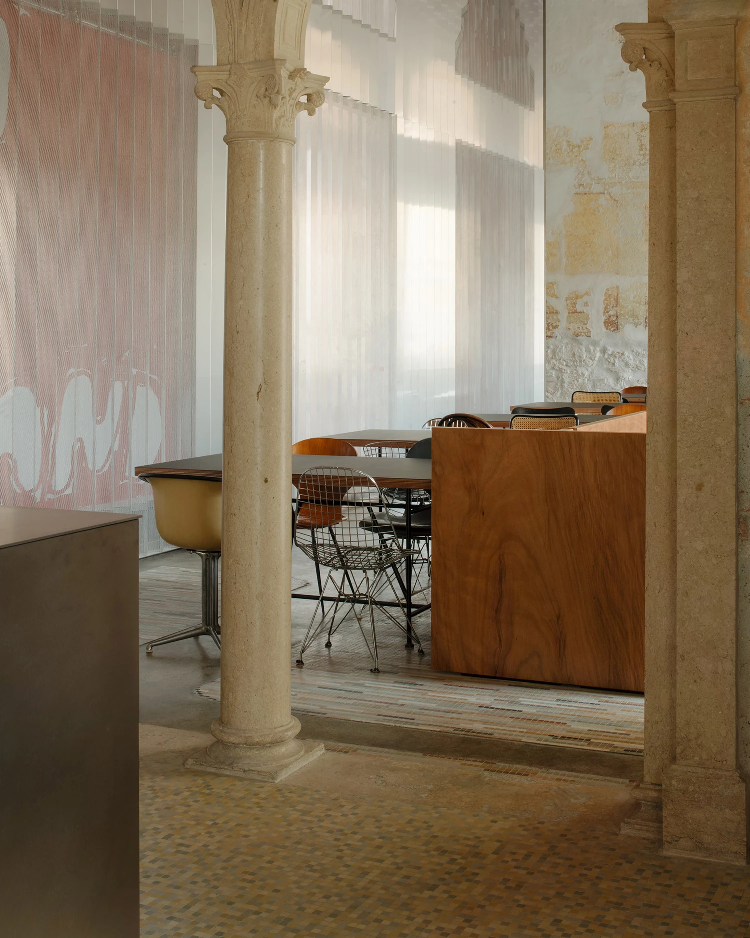 Caffè Nazionale by AMAA in Arzignano Italy, adaptive reuse of 19th-century palazzo with pleated stainless steel walls, okumè plywood ceiling and preserved historical patinas