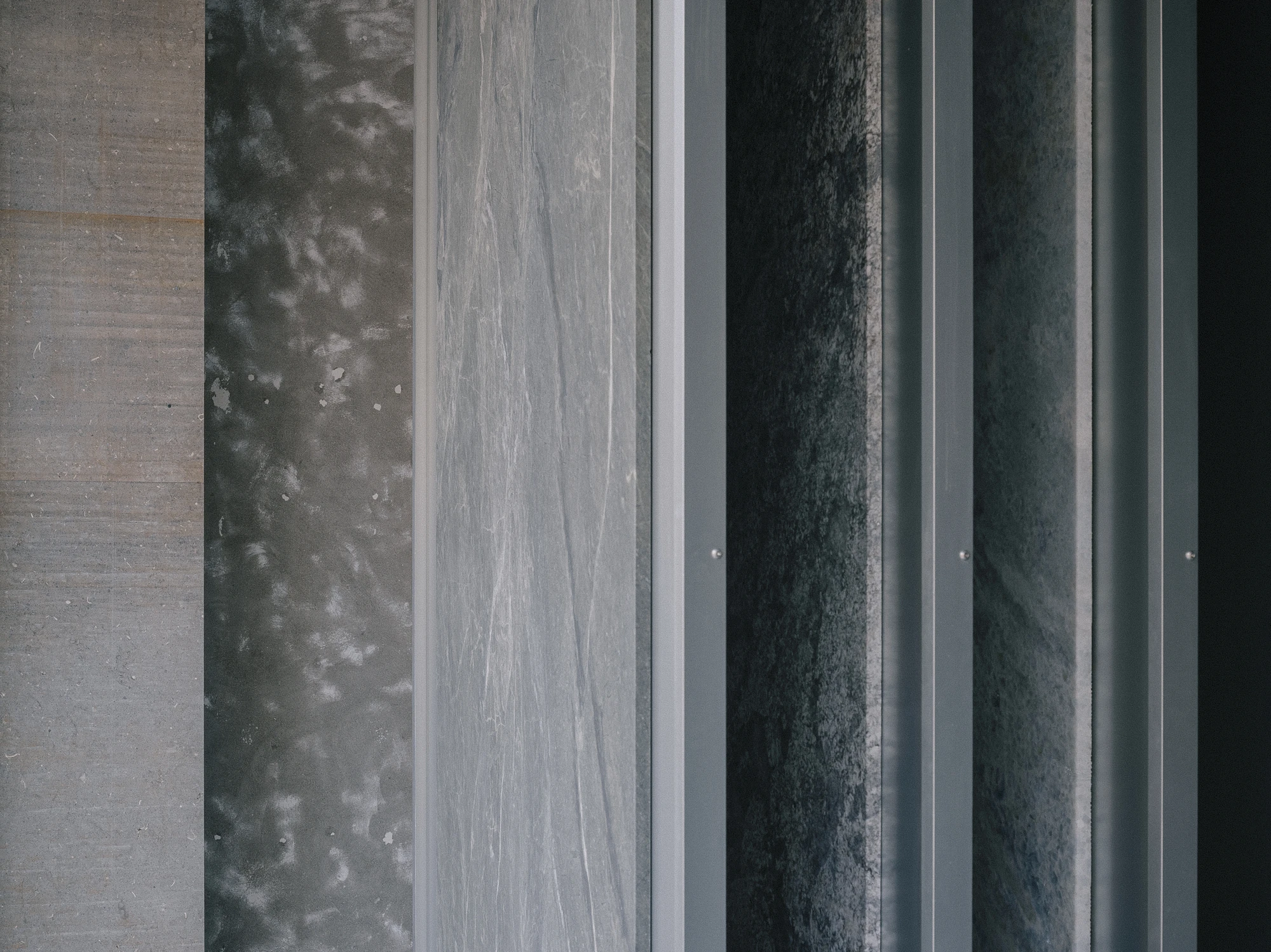 ST01 Flagship Store Seoul, South Korea, stone showroom, Lee Yongbaek, palladiana floor, rail-mounted panels, interiors