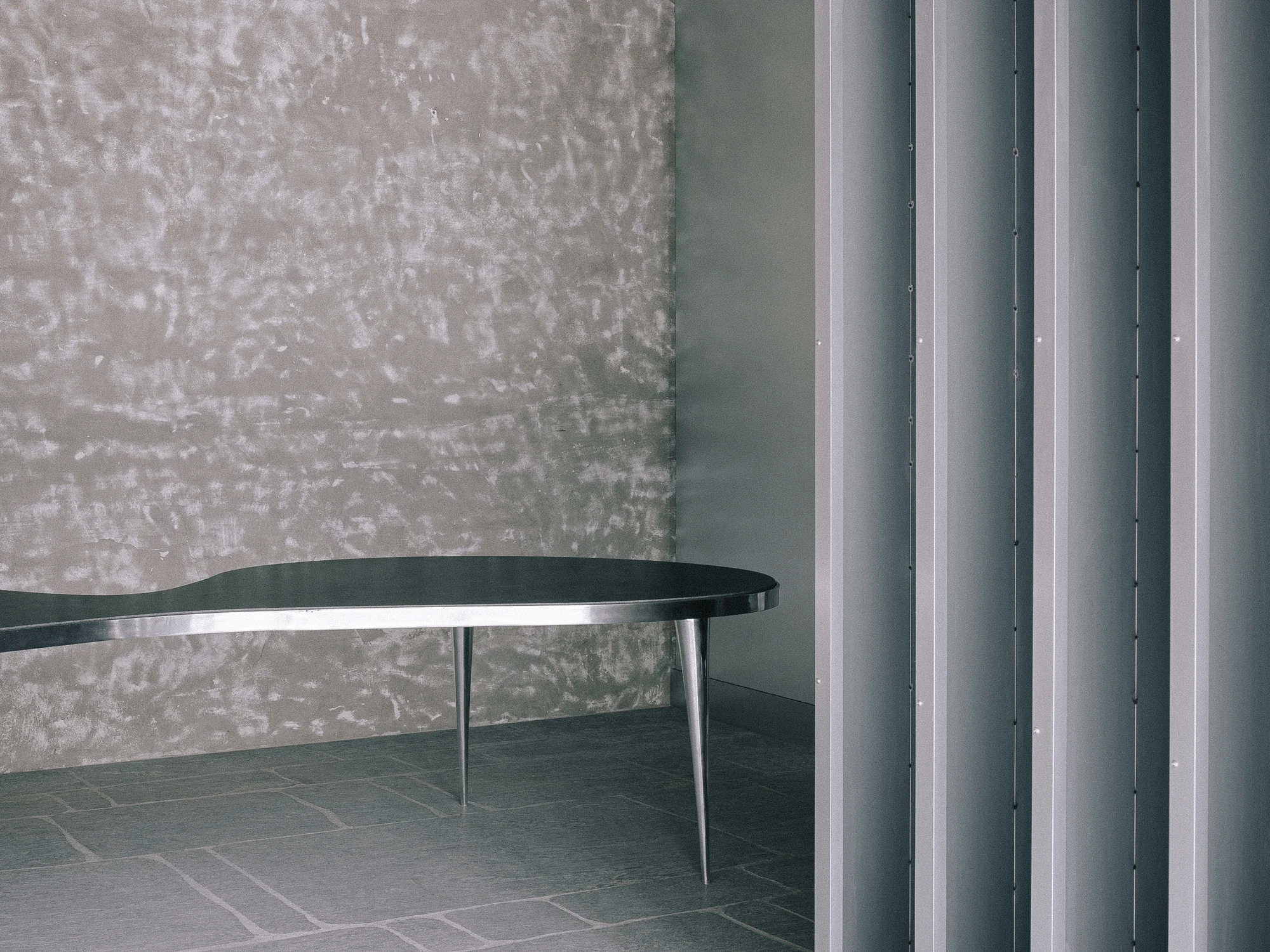 ST01 Flagship Store Seoul, South Korea, stone showroom, Lee Yongbaek, palladiana floor, rail-mounted panels, interiors