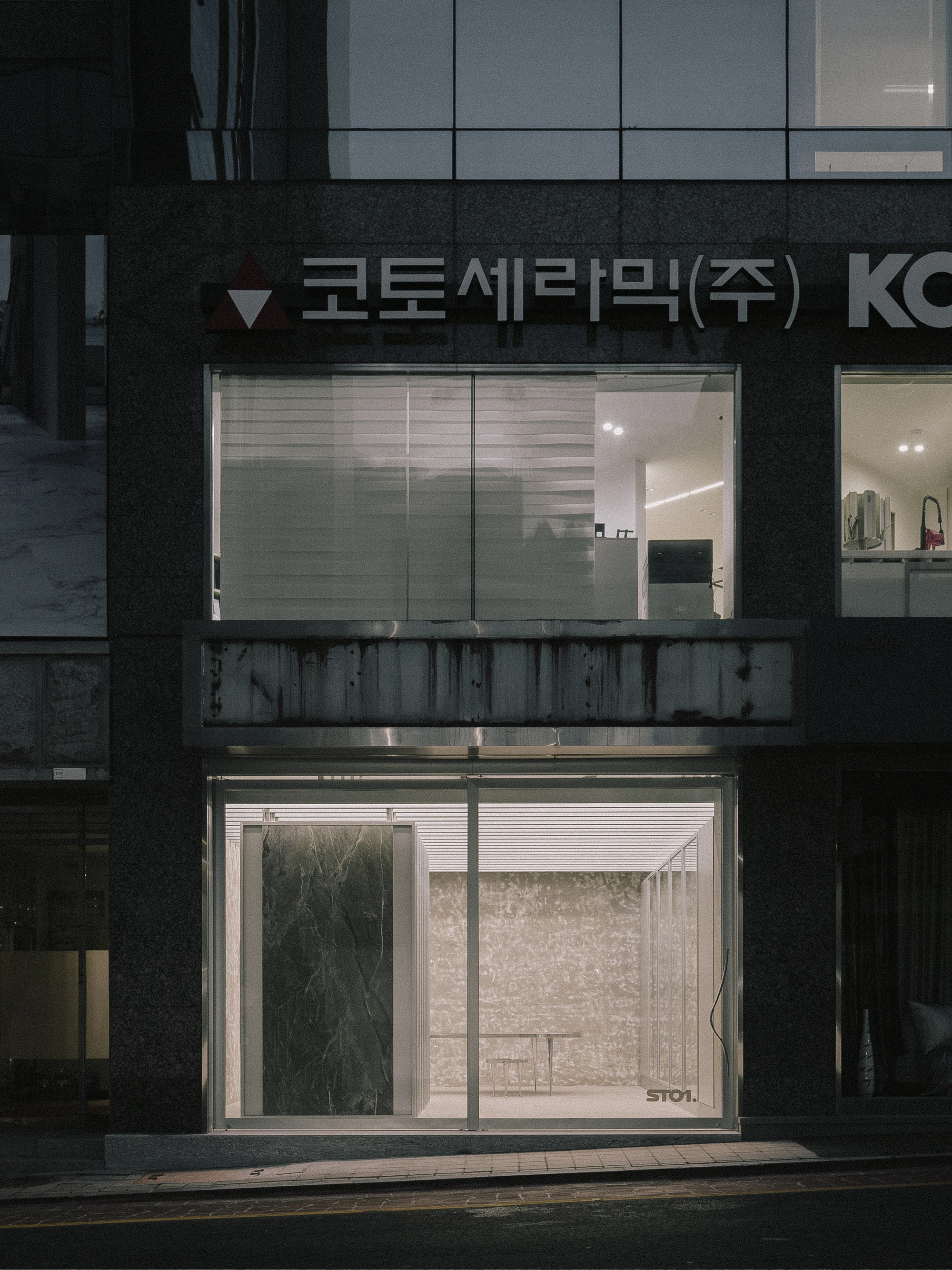 ST01 Flagship Store Seoul, South Korea, stone showroom, Lee Yongbaek, palladiana floor, rail-mounted panels, interiors