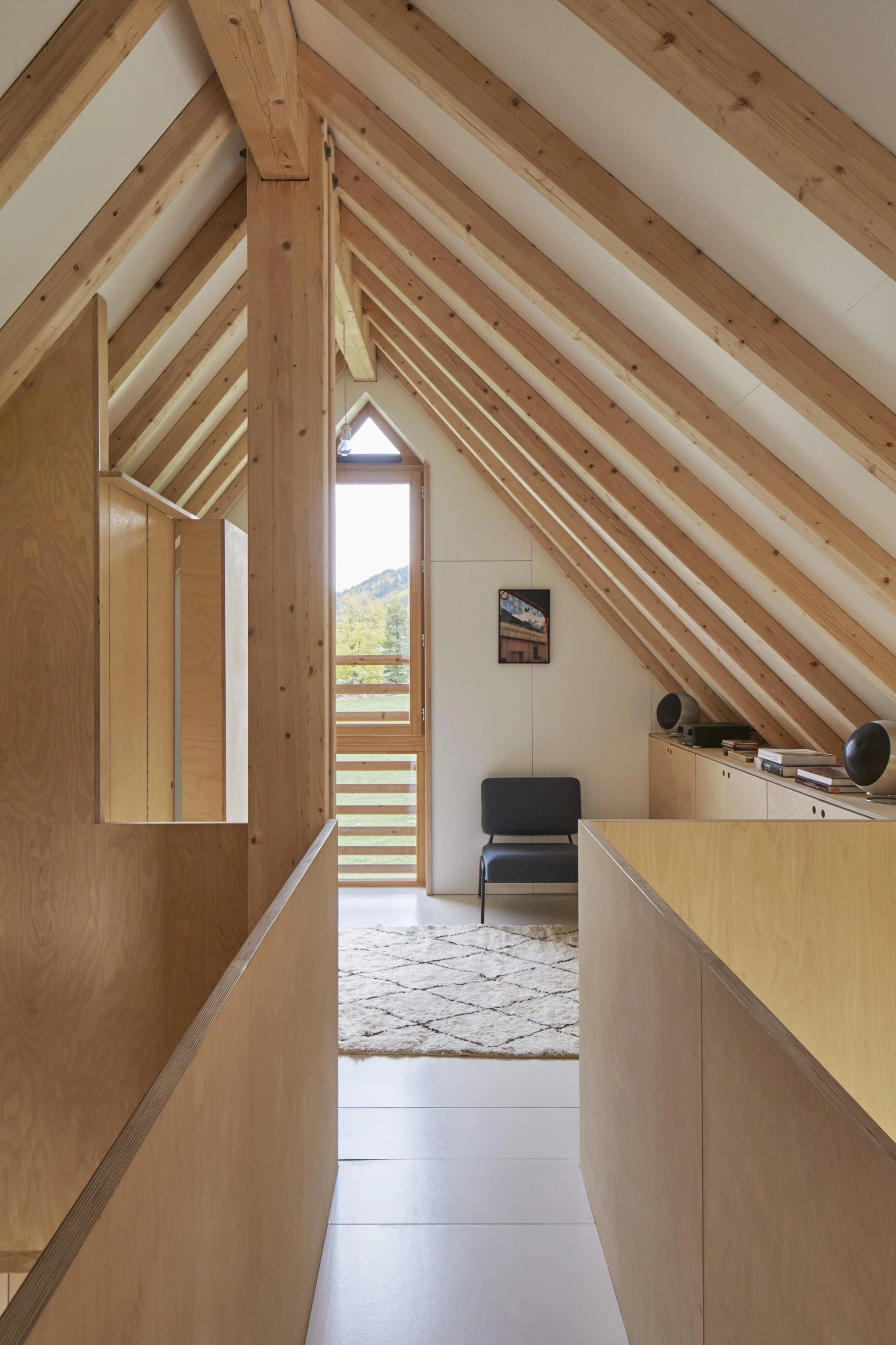 L'Onde house by arba architecture, Murat Cantal France, larch cladding zinc wave roof, rural architecture