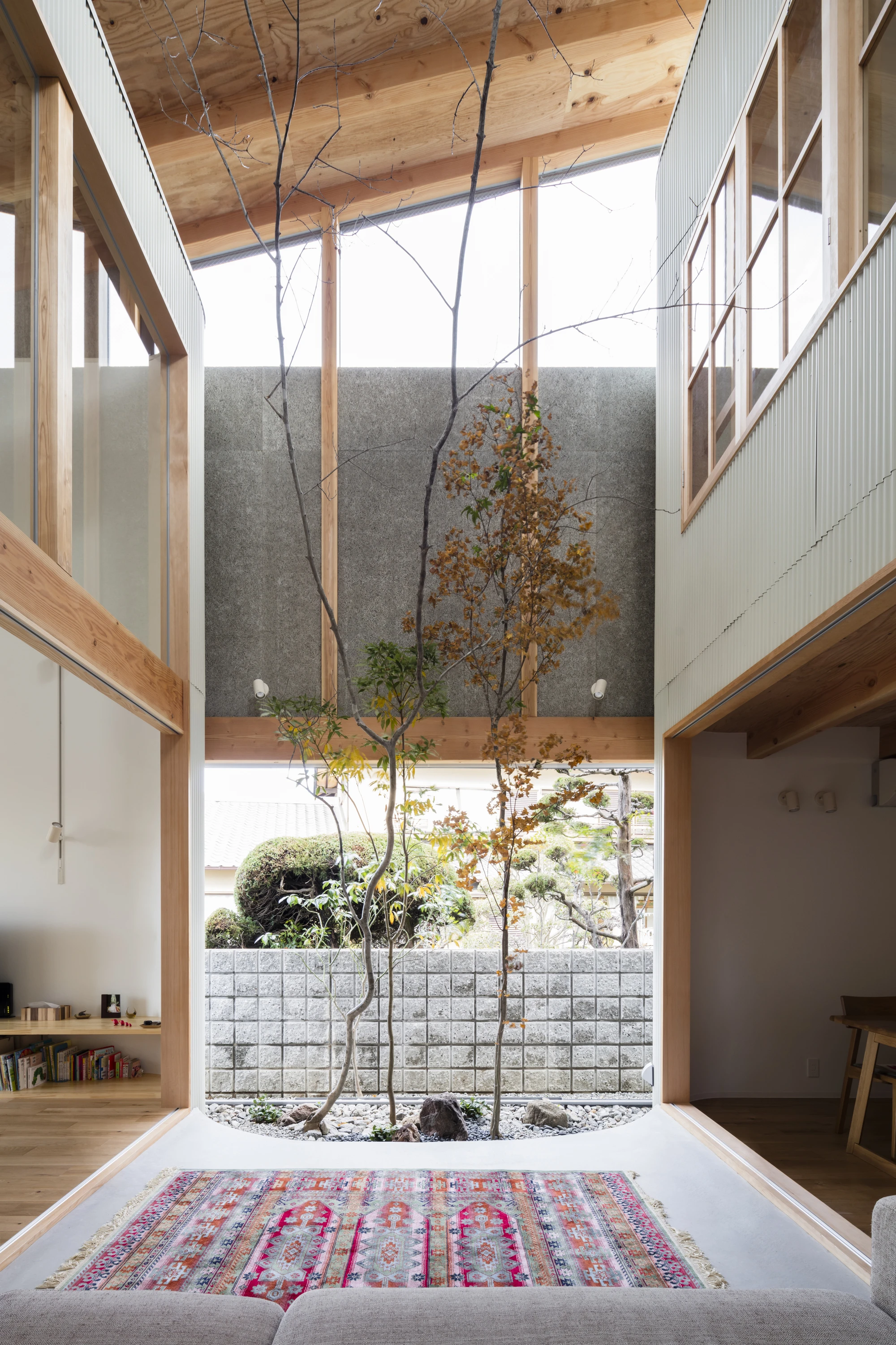 Melt house by SAI Architectural Design Office Satoshi Saito, Yao Osaka Japan, narrow courtyard house, dry garden