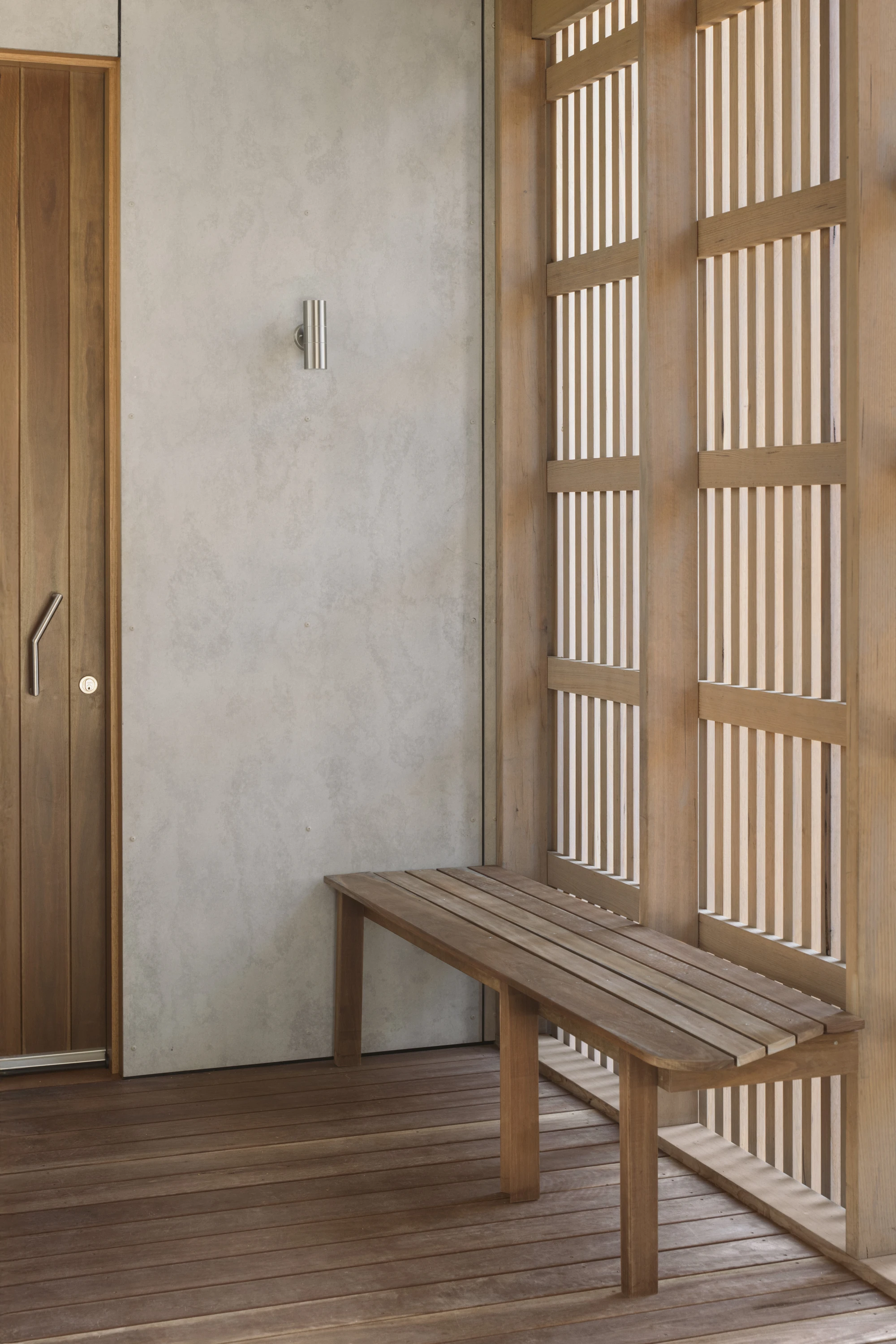 First House Past the Trees by Josh Cole WORKCRAFT in Barwon Heads Australia, residential architecture built around protected Moonah trees with fibre-cement and timber batten screens