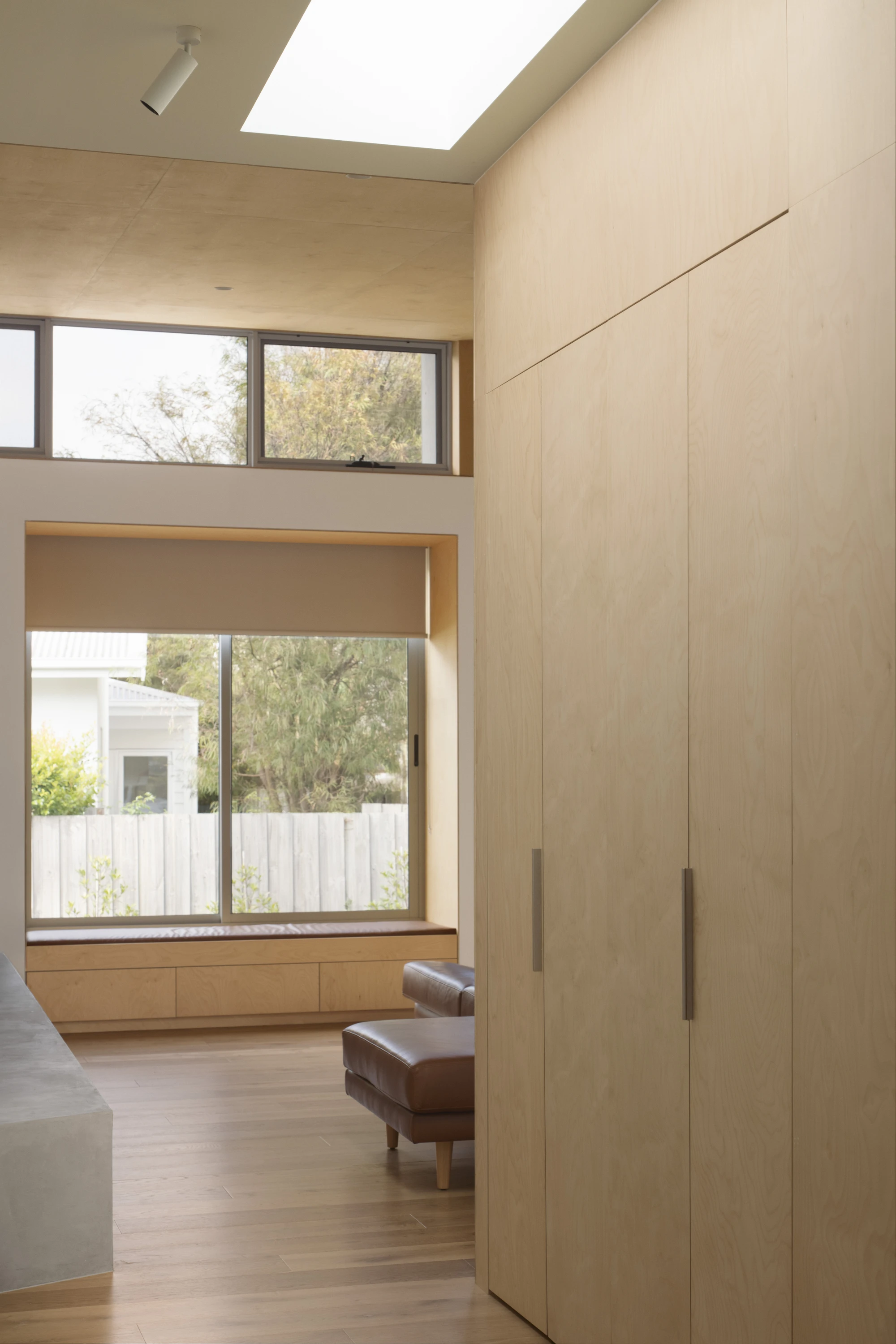 First House Past the Trees by Josh Cole WORKCRAFT in Barwon Heads Australia, residential architecture built around protected Moonah trees with fibre-cement and timber batten screens
