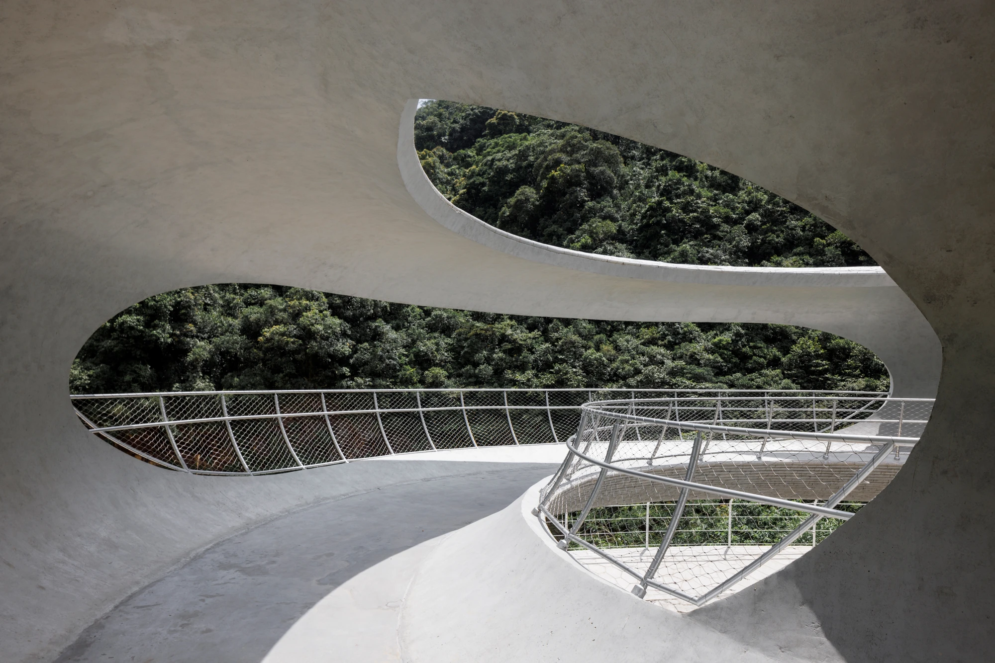Resting Loop with Views by HCCH Studio — Overhead perspective of the concrete ring's interior reveals the project's framing strategy in action.
