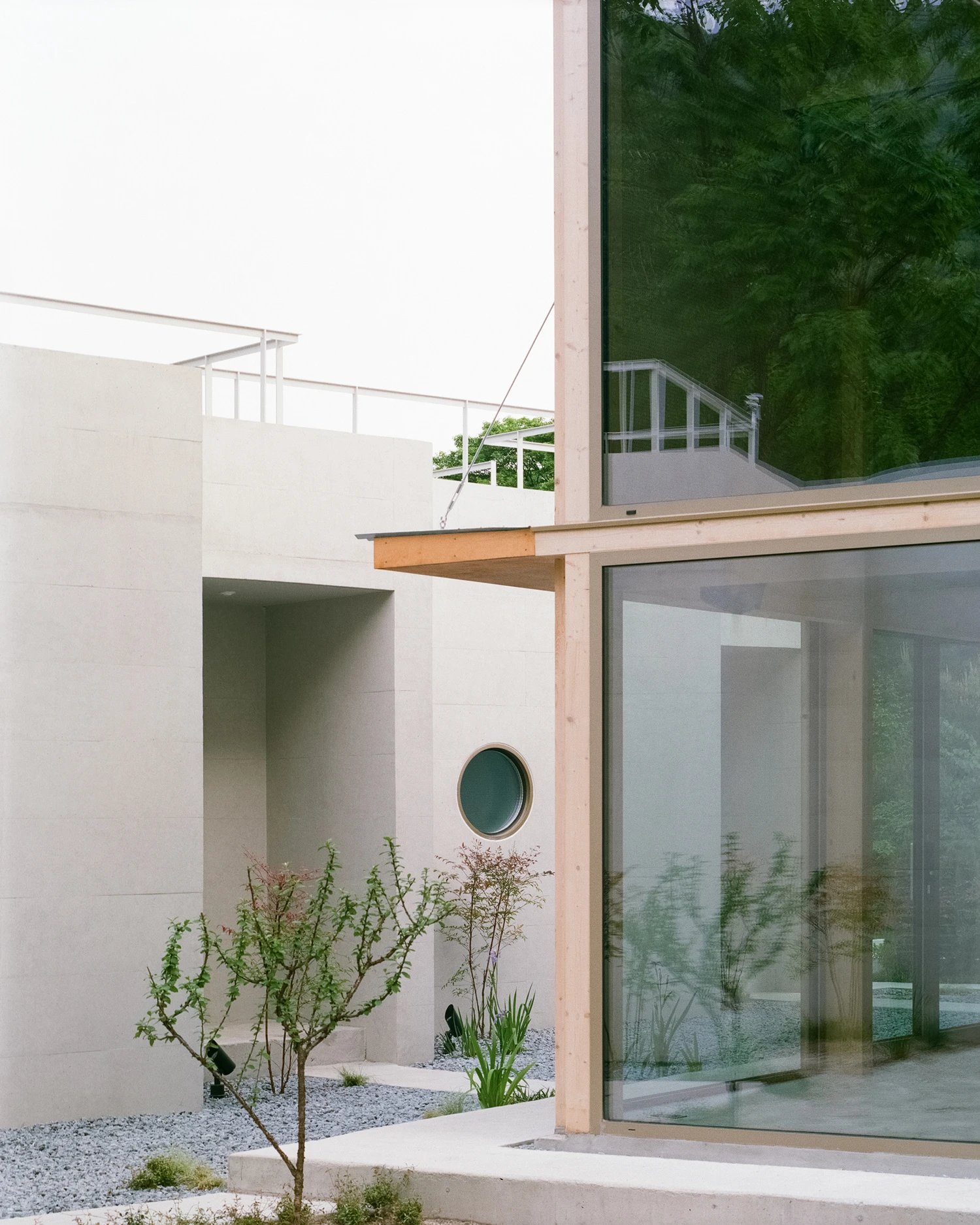 AT.MOS.PHERE work retreat by Agit Studio Architects with concrete and timber volumes, family house, architecture, South Korea