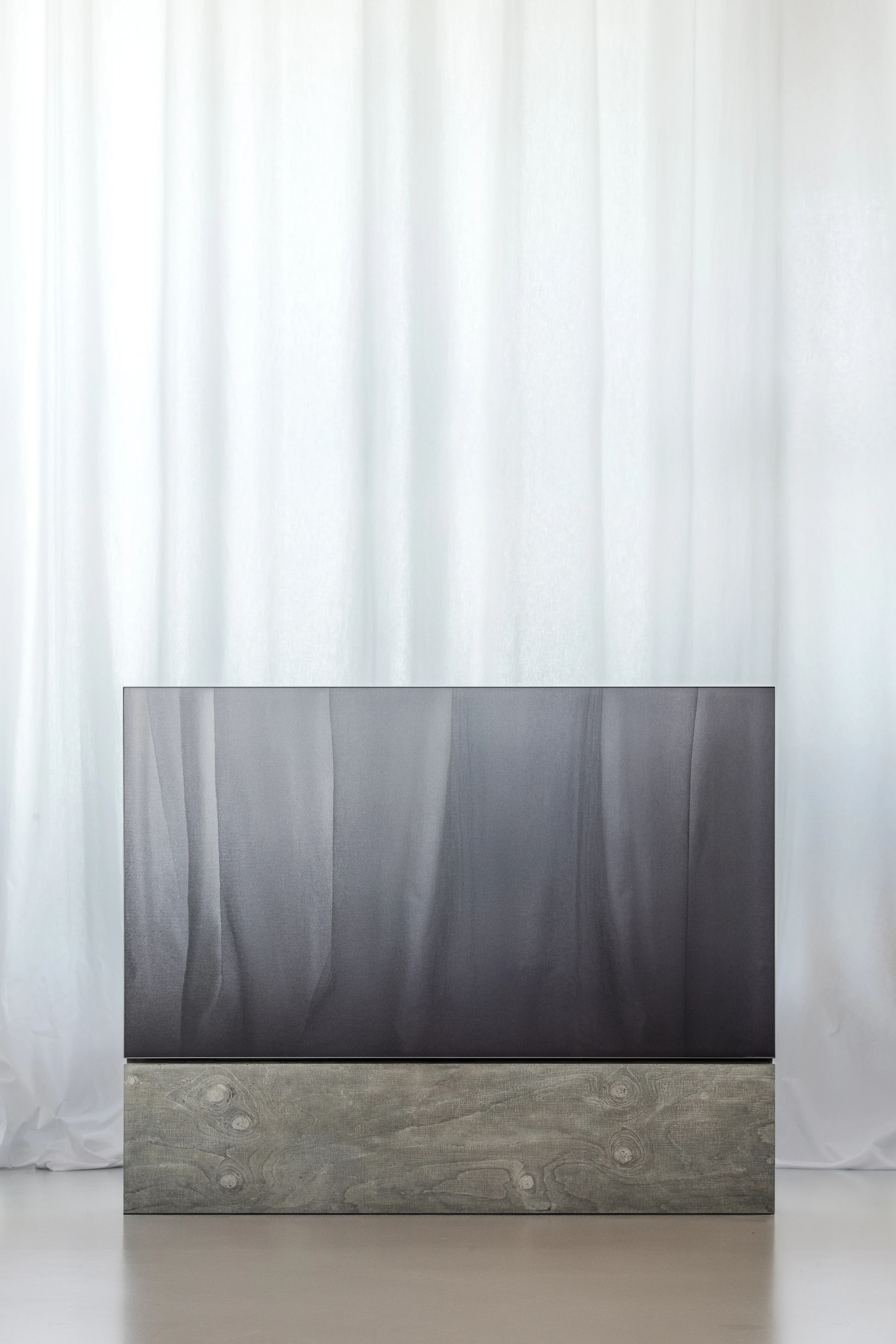 Concrete TV Stand by David Bard — A television stand designed by David Bard demonstrates material hierarchy through asymmetrical composition.