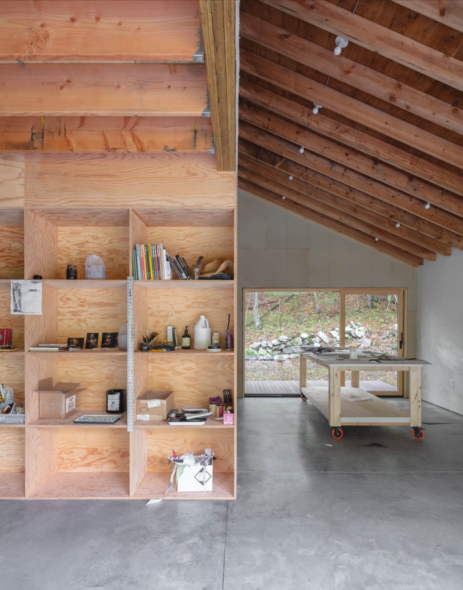 Studio Barn by Worrell Yeung — A studio workspace captures the material and spatial organization of the barn renovation.