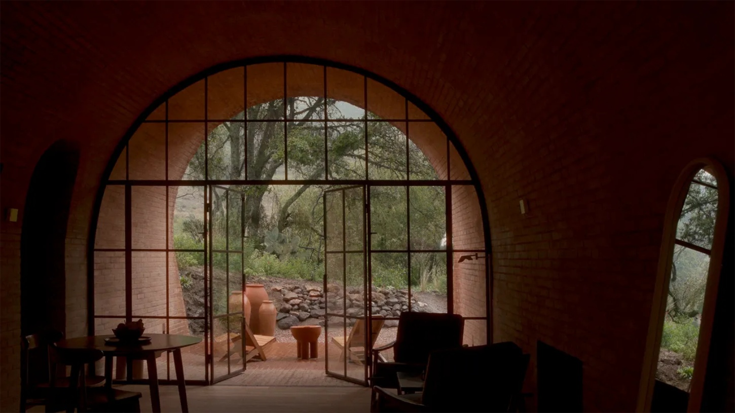 Casa de Barro by Goma Architects nestles into the rolling hills of Amealco, a vaulted brick retreat at Rancho El Ameyal