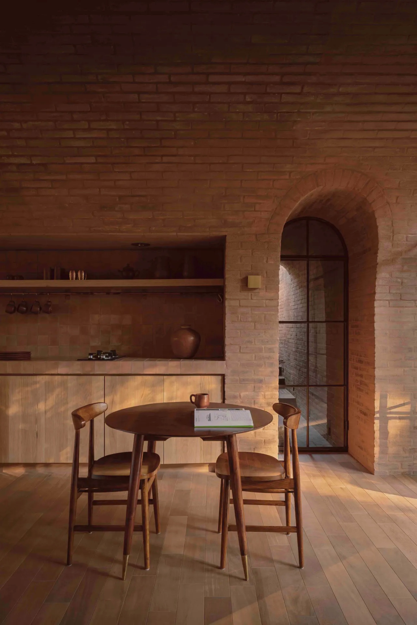 Casa de Barro by Goma Architects nestles into the rolling hills of Amealco, a vaulted brick retreat at Rancho El Ameyal