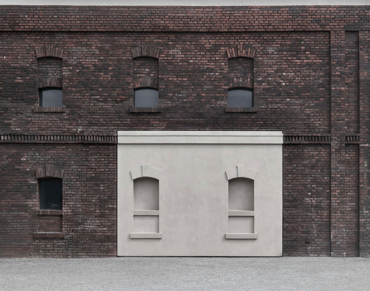 PLATO Contemporary Art Gallery by KWK PROMES — A micro-concrete pavilion with rectilinear geometry interrupts the brick facade, its pristine white surface creating pronounced material contrast against...