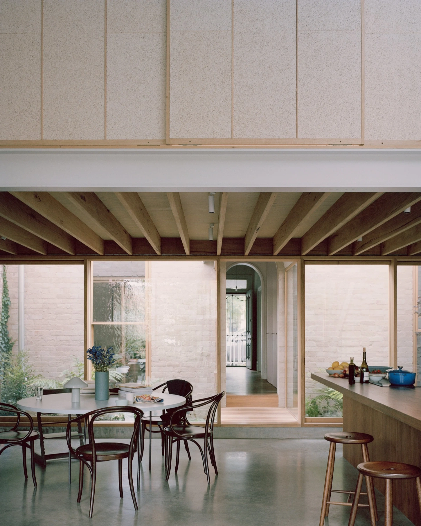 Lovell Burton reworks a neglected Victorian terrace in Carlton into a light-filled, flexible house that blends history with modern living.
