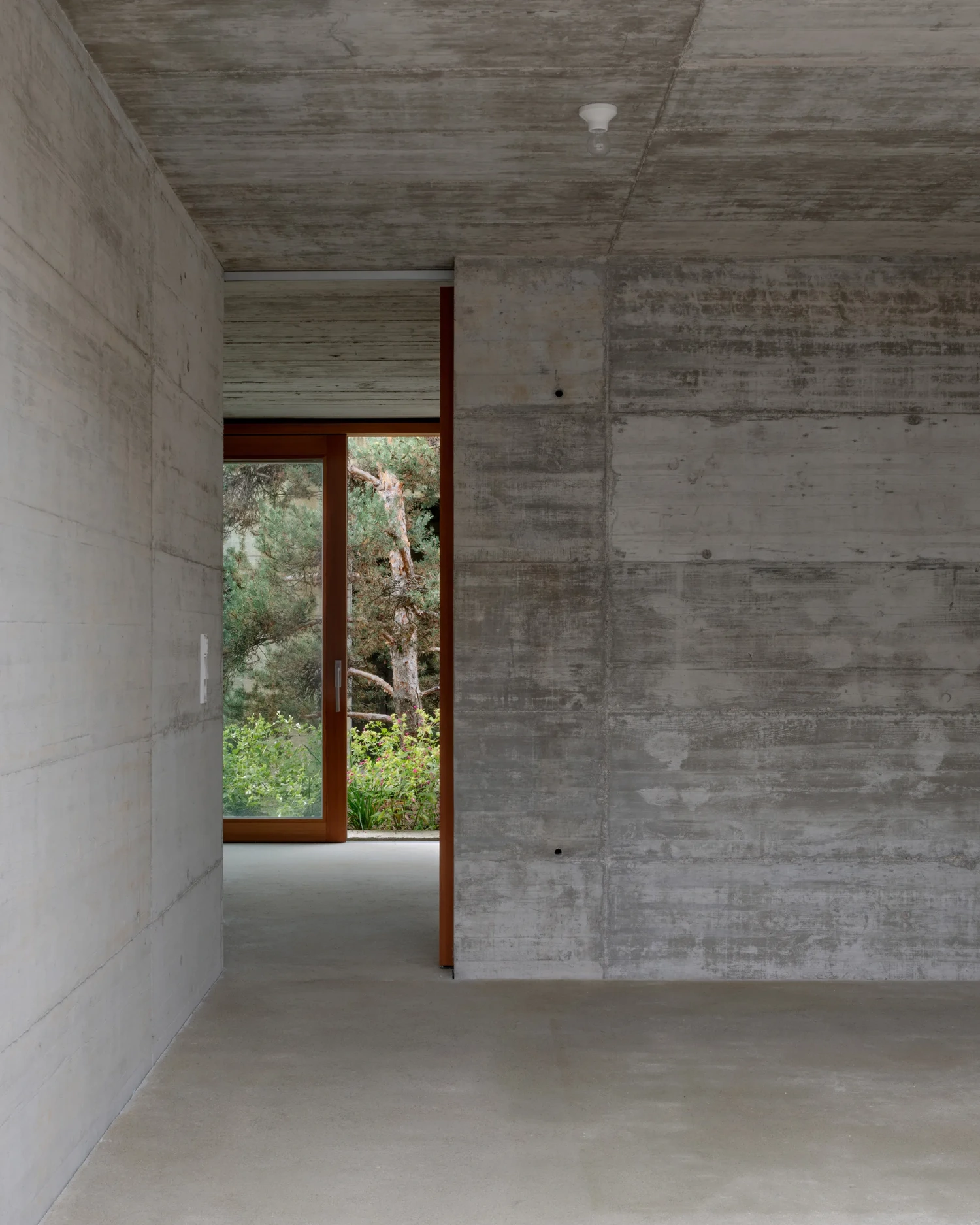 House with two courtyards by BÜRO MÜHLBAUER, concrete architecture, minimalist villa, german architecure, wood