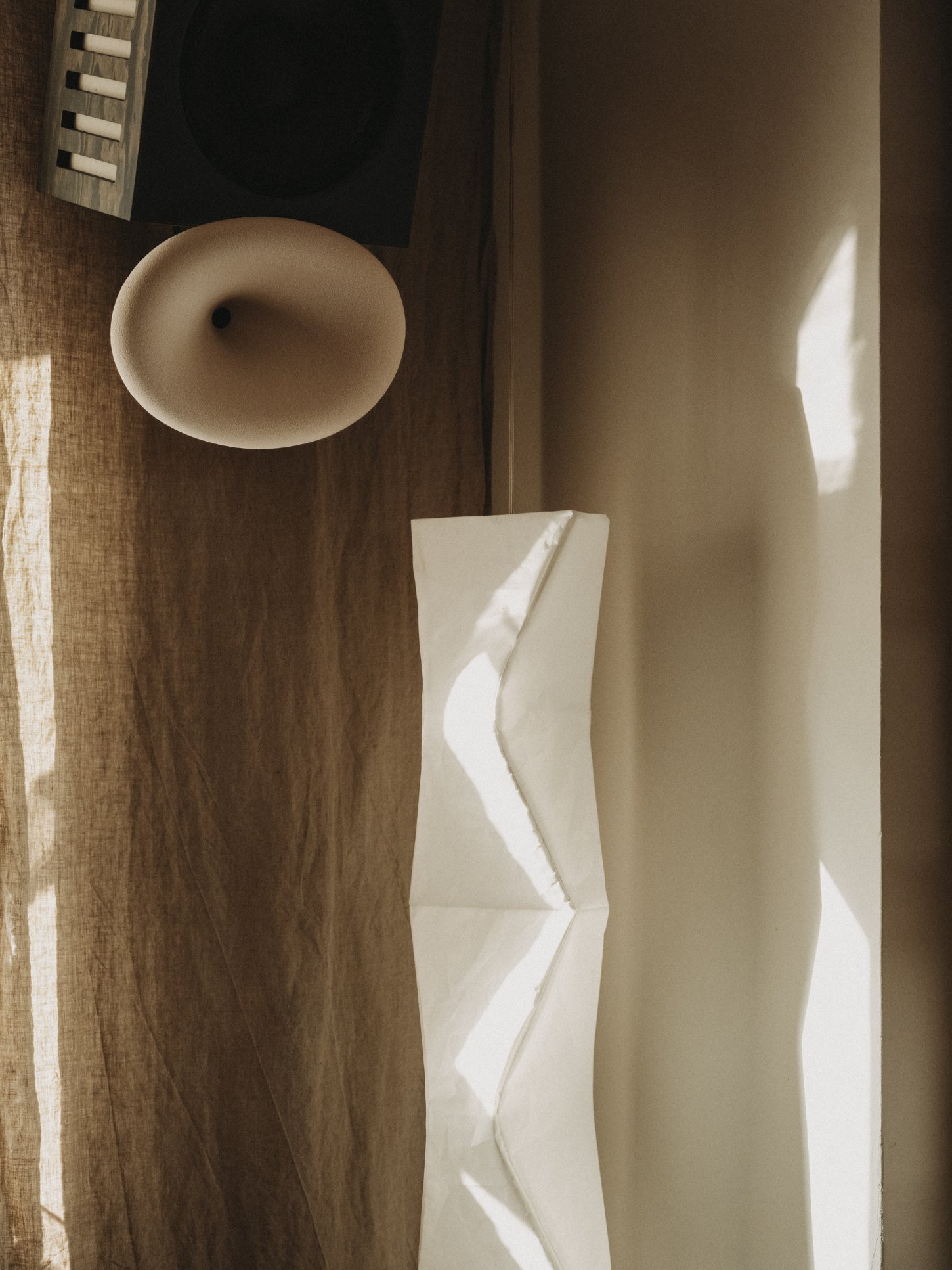 Amator Restaurant by wiercinski-studio — Detail of Amator's dining installation capturing the intersection of material and light.
