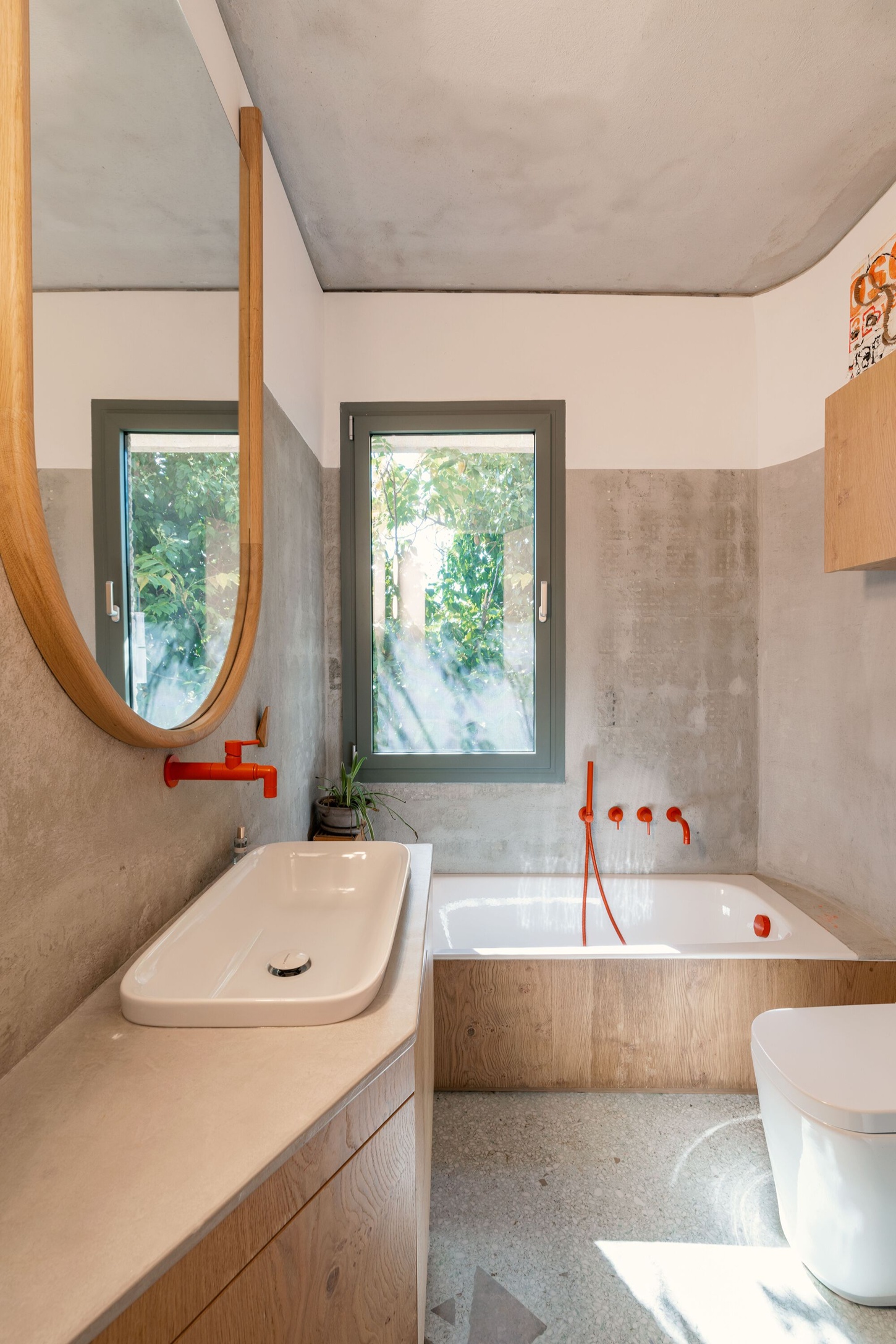 Three Object Apartment by DeMachinas + Elina Loukou — The bathroom consolidates three functional zones within a narrow footprint.