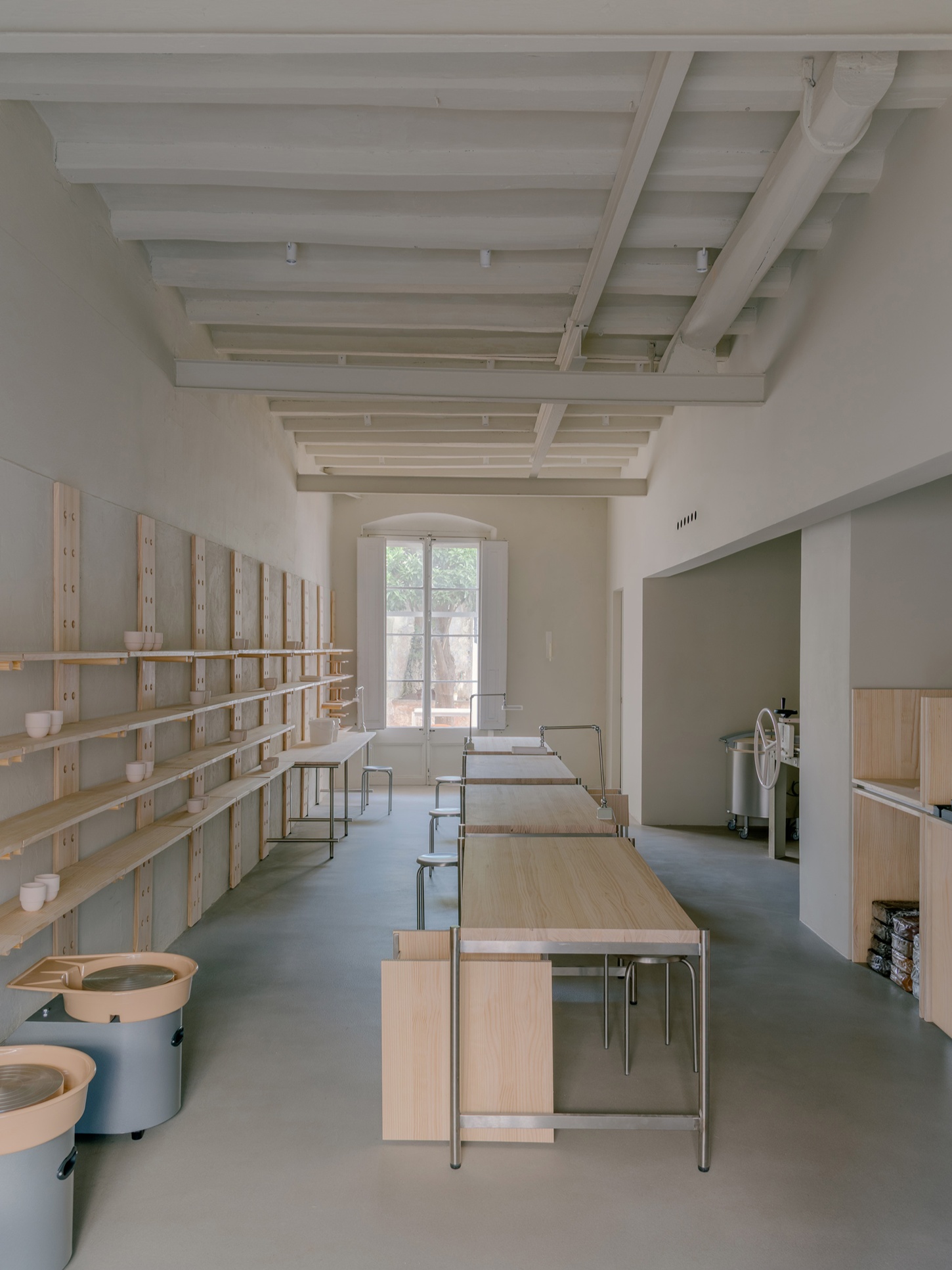 Catalina Studio by Correa Studio is a modular, tactile minimalist space for ceramic in Barcelona where form supports function and flow