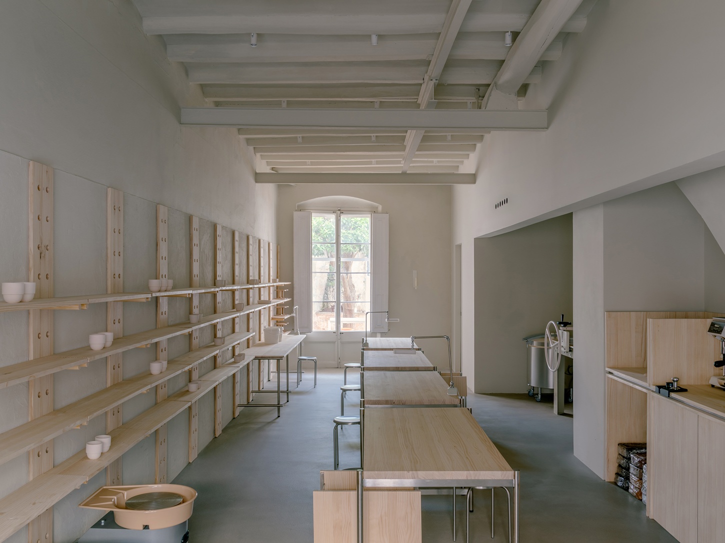 Catalina Studio by Correa Studio is a modular, tactile minimalist space for ceramic in Barcelona where form supports function and flow