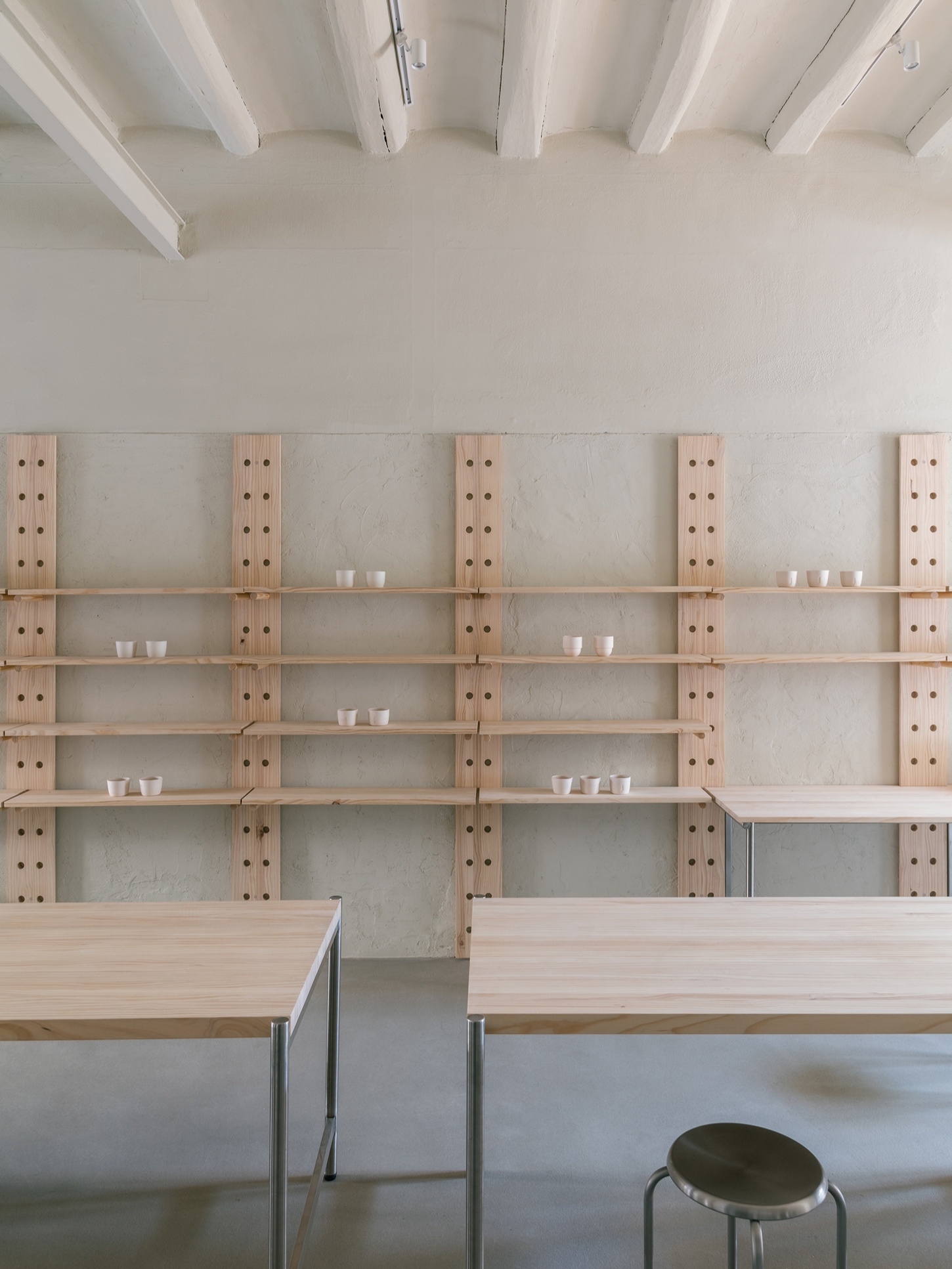 Catalina Studio by Correa Studio is a modular, tactile minimalist space for ceramic in Barcelona where form supports function and flow