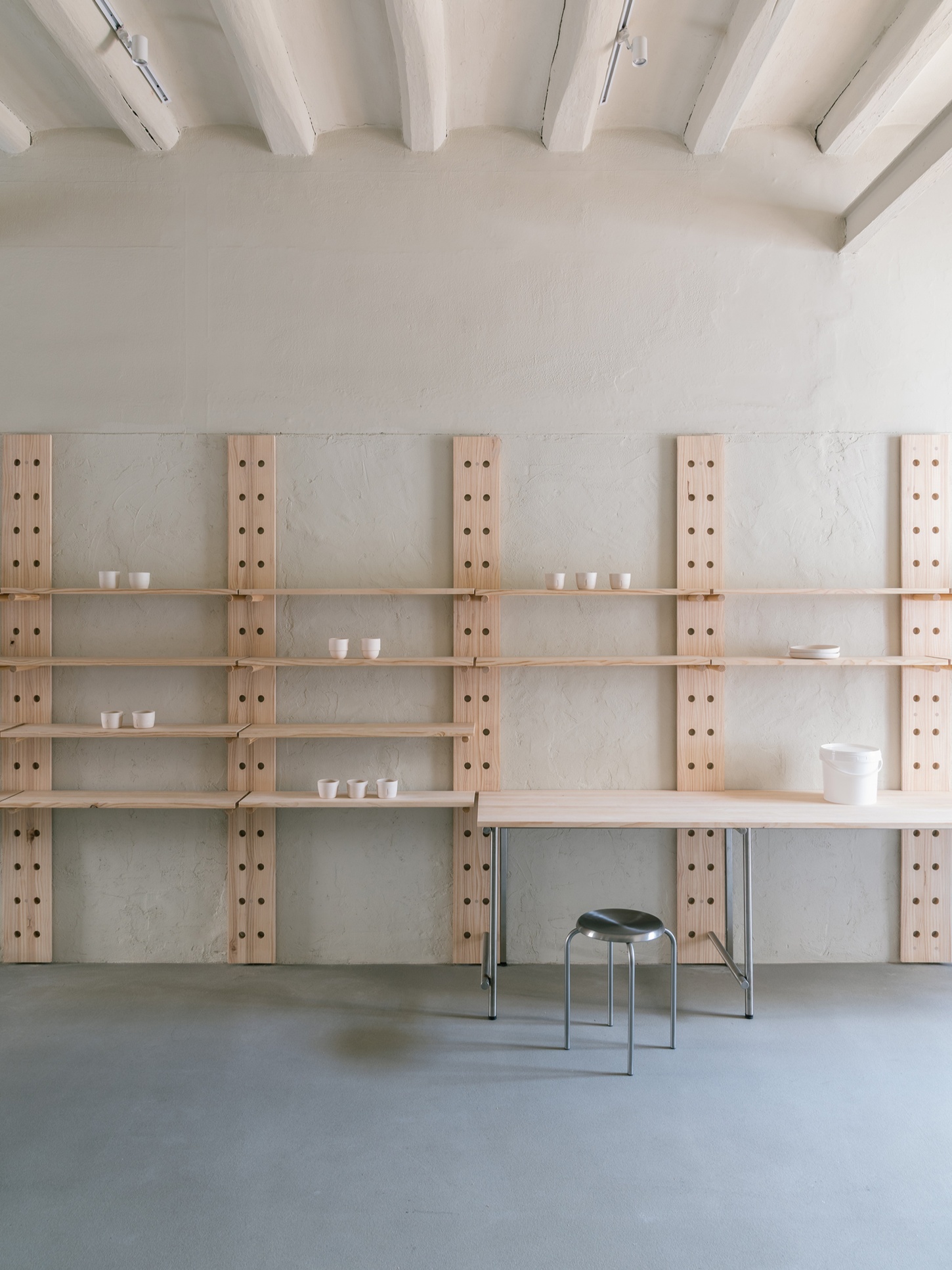 Catalina Studio by Correa Studio is a modular, tactile minimalist space for ceramic in Barcelona where form supports function and flow
