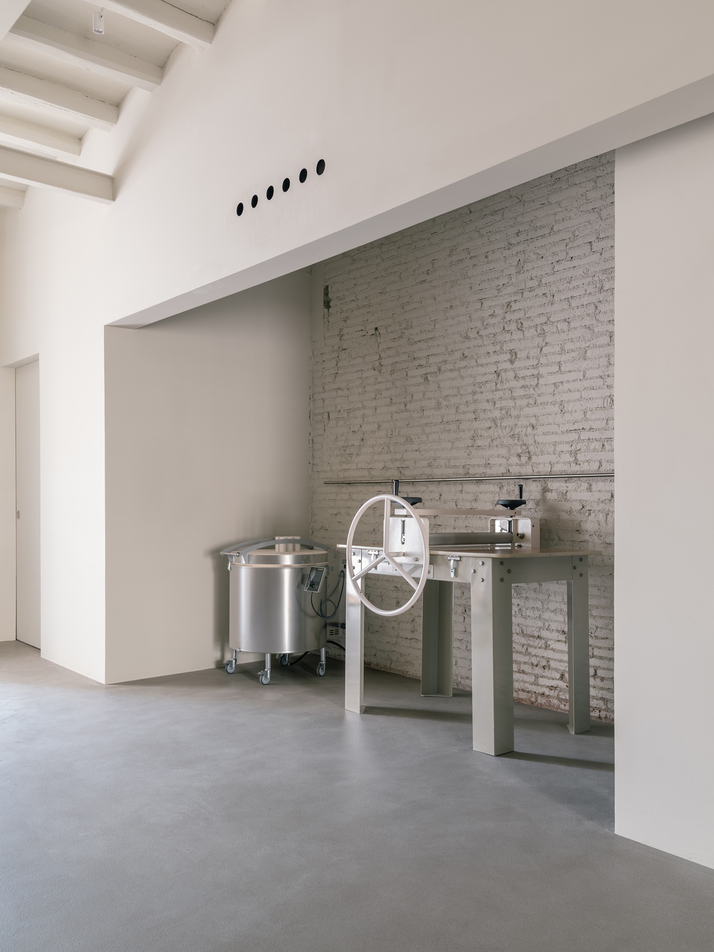 Catalina Studio by Correa Studio is a modular, tactile minimalist space for ceramic in Barcelona where form supports function and flow