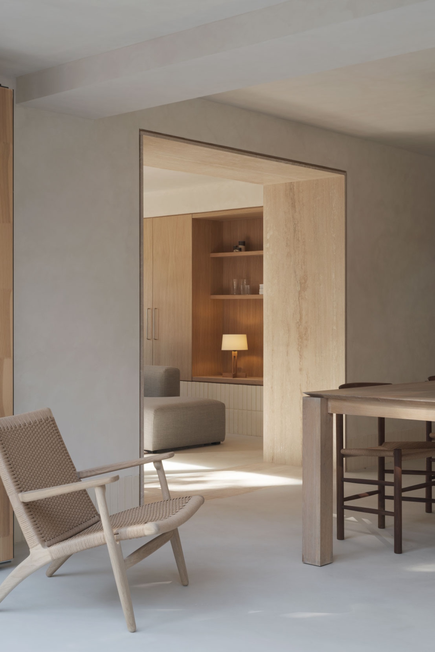 Casa SO by Studio DIIR — A timber-framed threshold articulates the passage between living and private spaces.