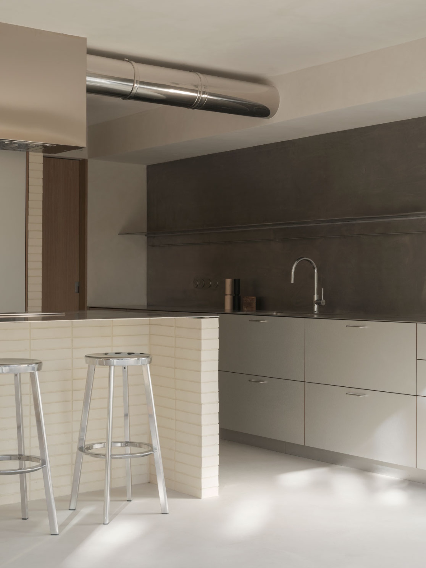 Casa SO by Studio DIIR — The kitchen anchors Casa SO's domestic infrastructure with deliberate material contrasts.