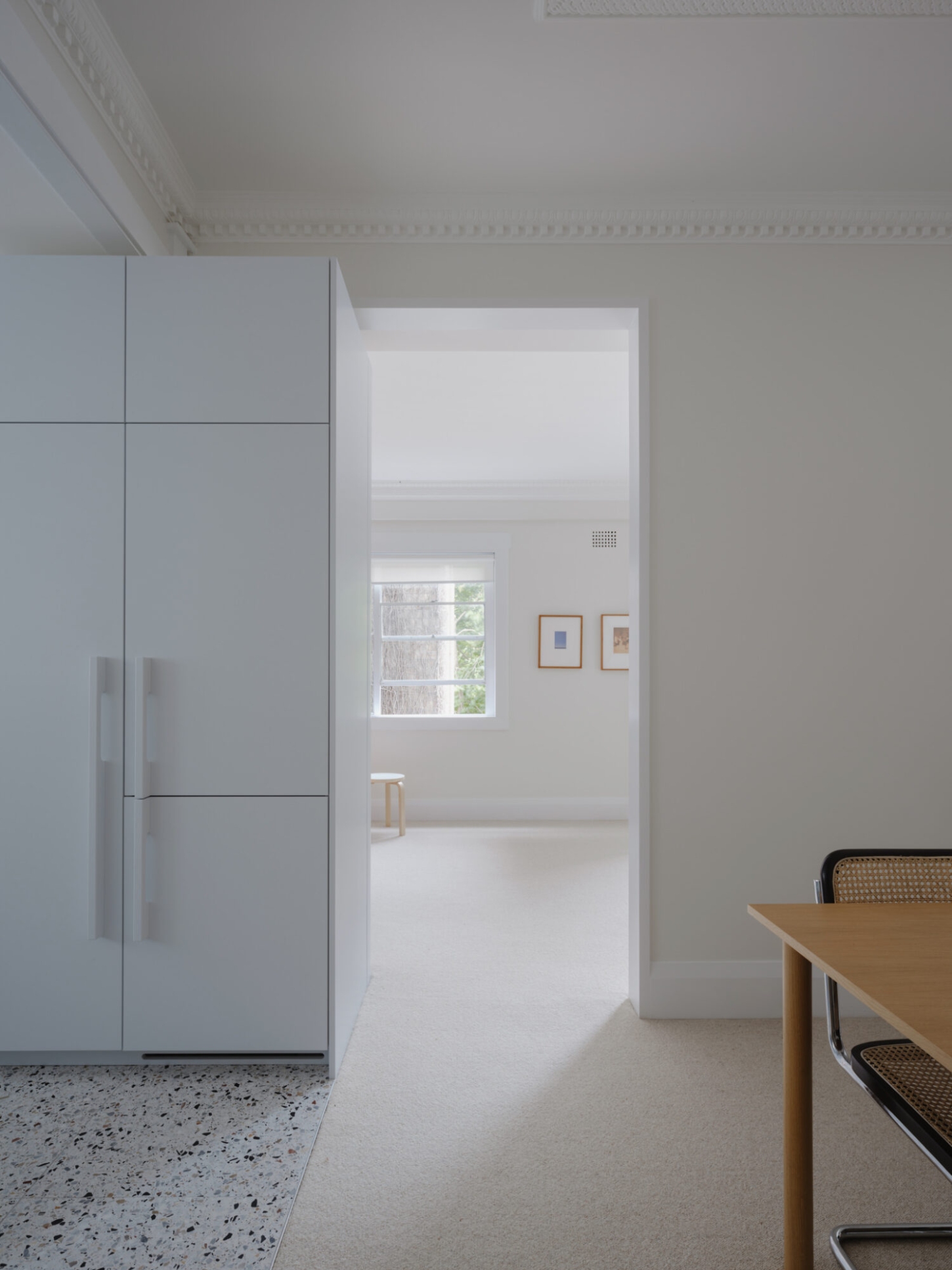 Onslow Gardens Apartment by Youssofzay Hart — Kitchen and threshold space demonstrating restrained modernist planning.