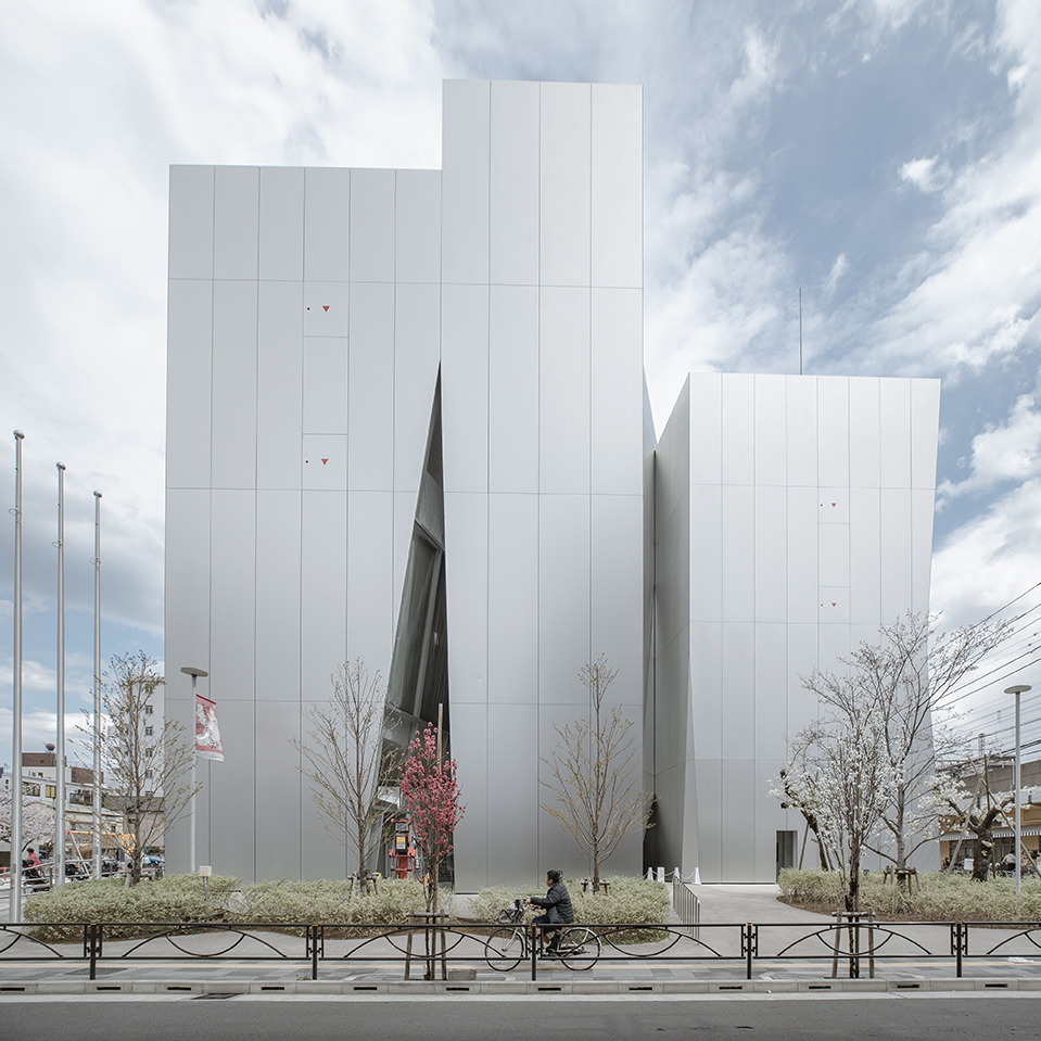 Sumida Hokusai Museum by Kazuyo Sejima — Jiachuan Liu's photograph captures the Sumida Hokusai Museum's frontal elevation under overcast sky, emphasizing the building's prismatic geometry.