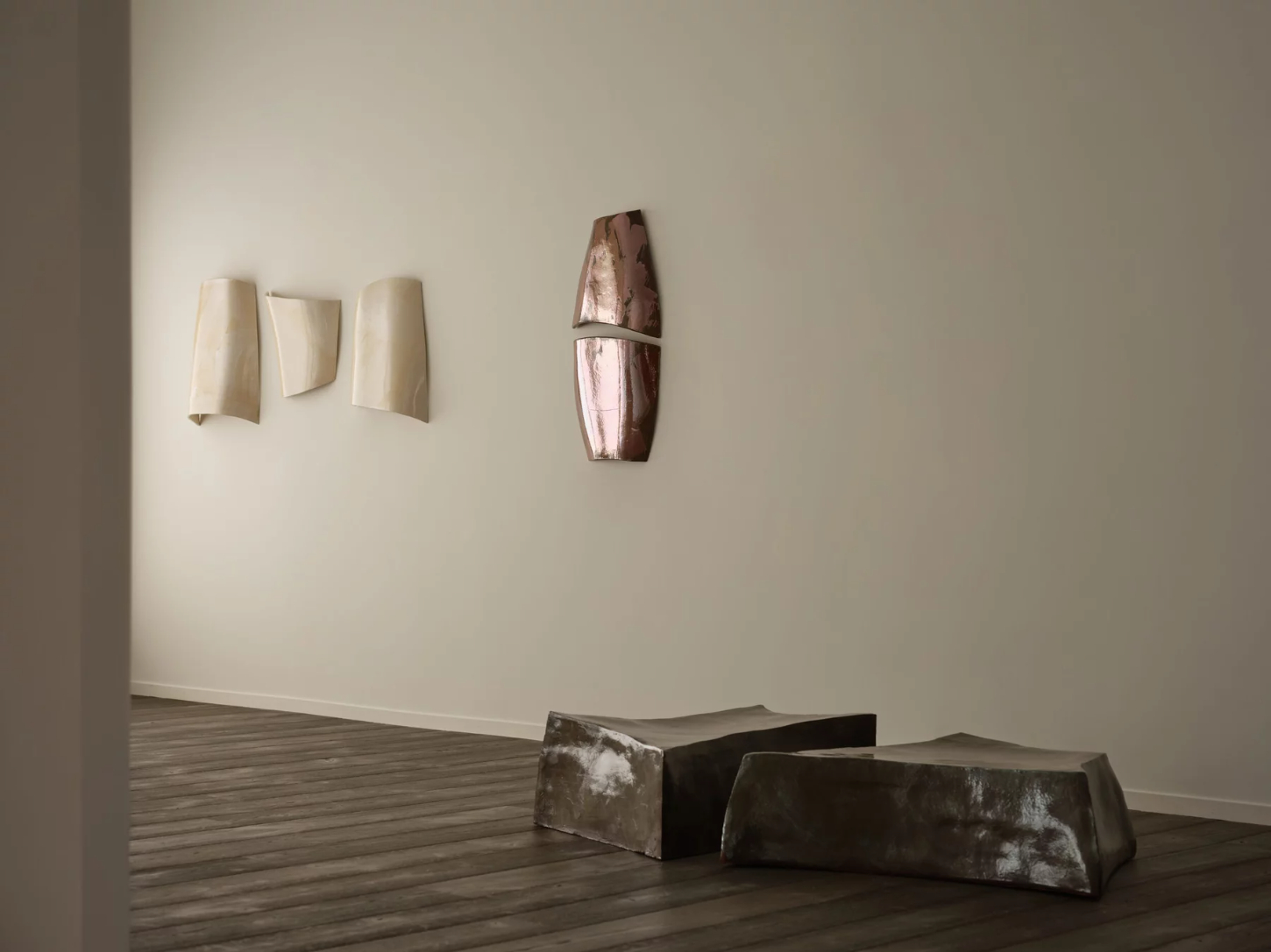 ‘Untitled’ by JAMESPLUMB & Garcé Dimofski at Francis Gallery — The gallery interior presents a sparse arrangement of weathered stone works across two distinct zones.