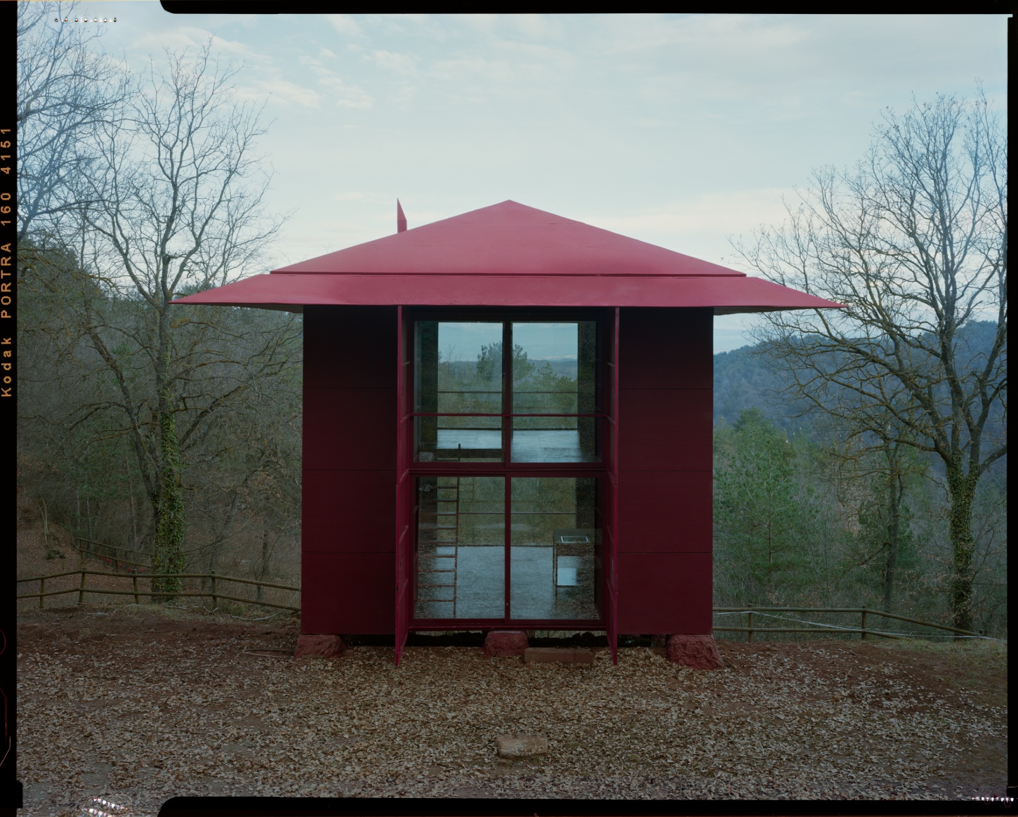 TEST perches prefab wooden house atop shotcrete pillars in barcelona woodlands spain