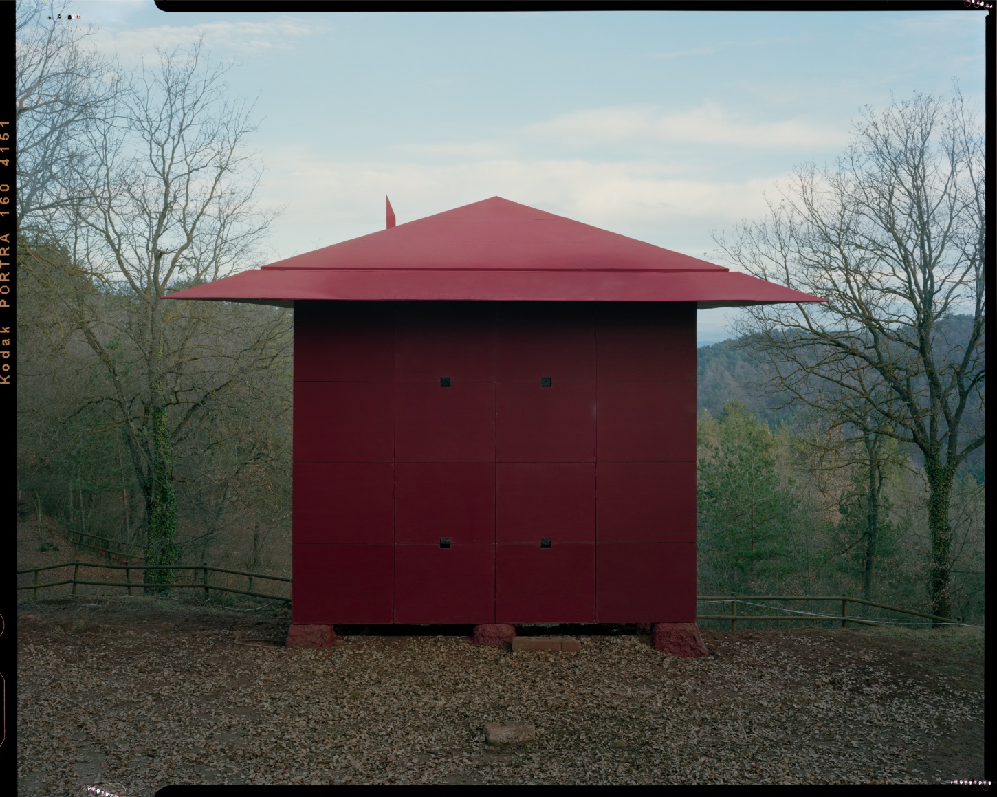 TEST perches prefab wooden house atop shotcrete pillars in barcelona woodlands spain
