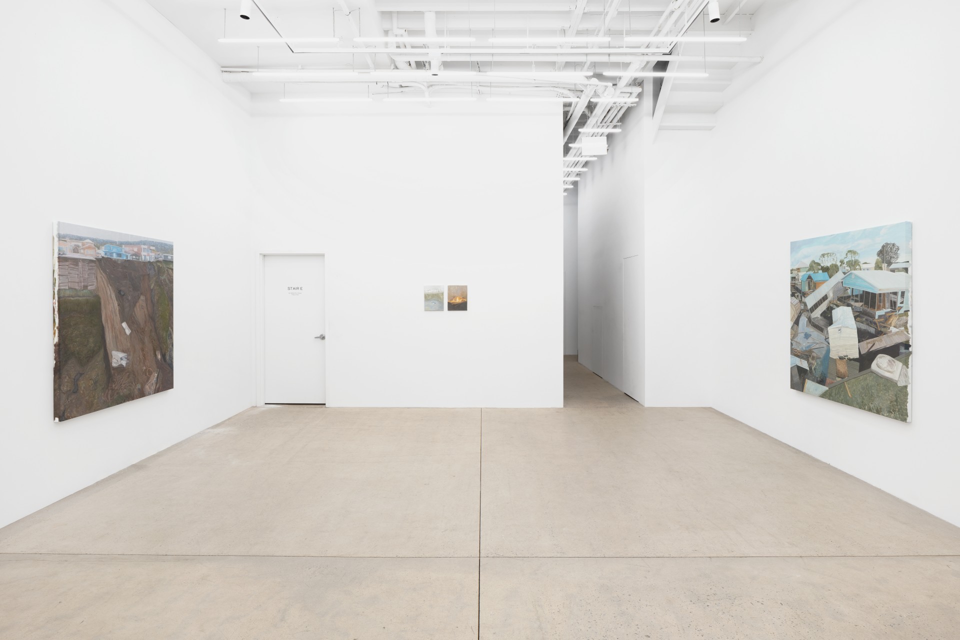 Mouthful of Dirty Copper by Rexy Tseng at Magenta Plains — The gallery installation presents three large-scale paintings mounted on white walls at staggered heights, anchored by a monolithic concrete staircase...