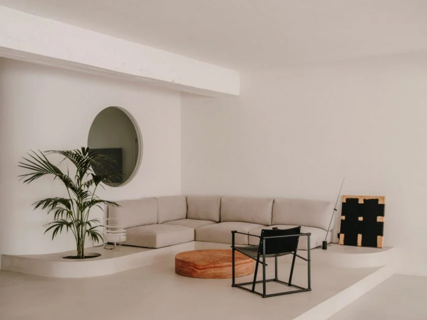 Isern Serra Studio — A 200-square-meter open studio interior with whitewashed plaster walls and exposed concrete ceiling.