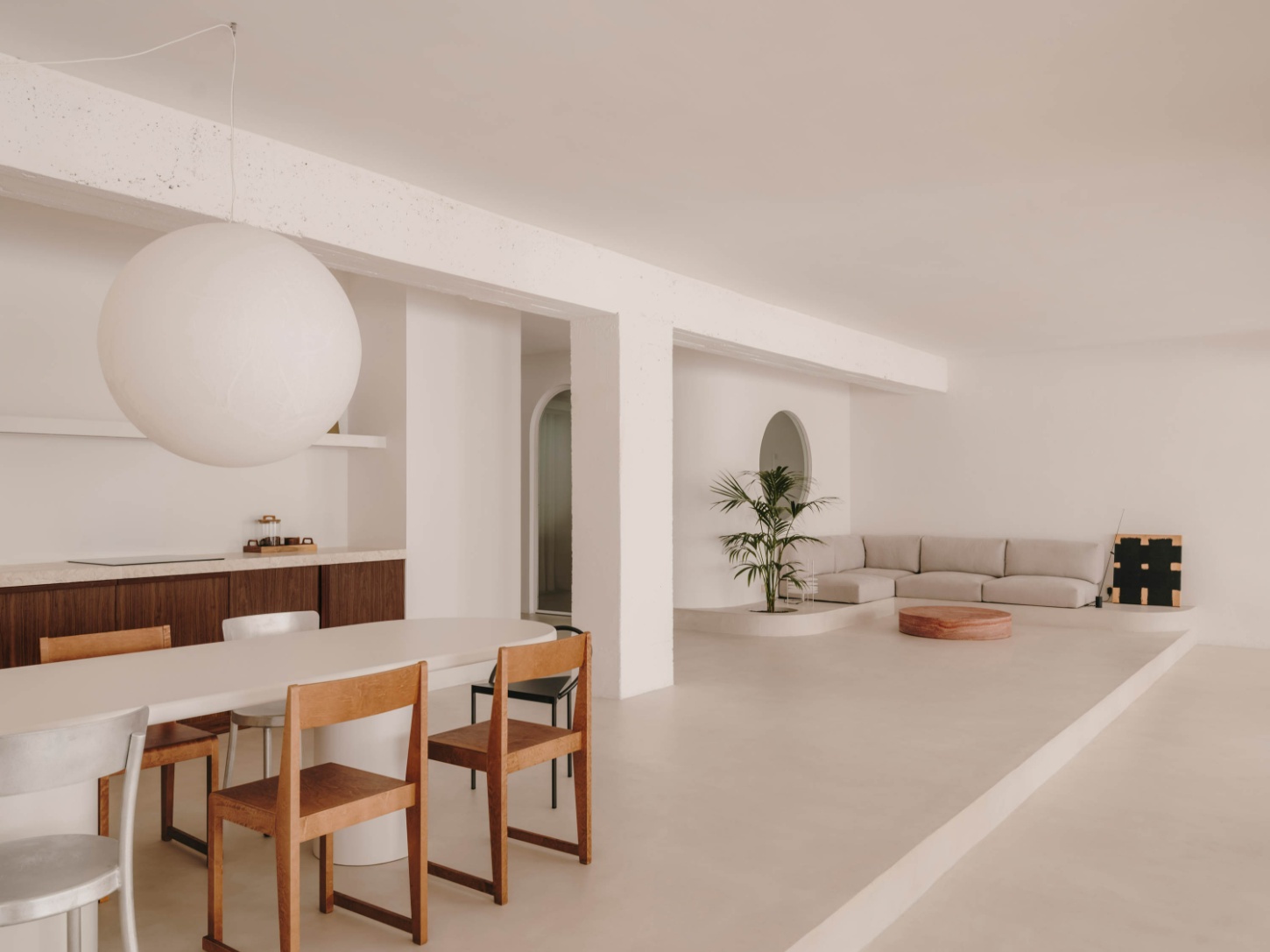 Isern Serra Studio — A 200-square-meter open-plan interior divides into functional zones through spatial arrangement rather than partition walls.