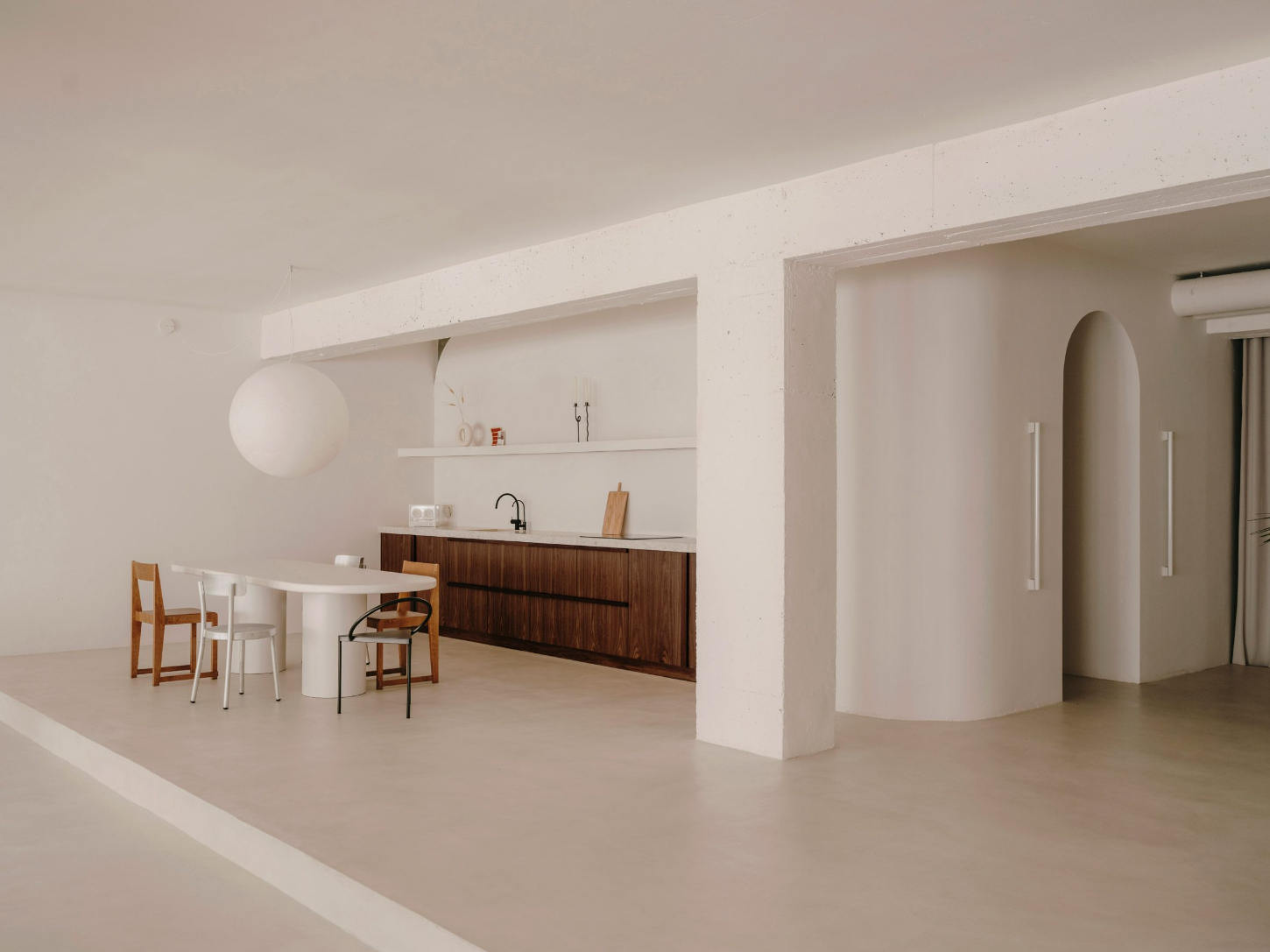 Isern Serra Studio — A 200-square-meter studio interior defined by horizontal stratification and material contrast.