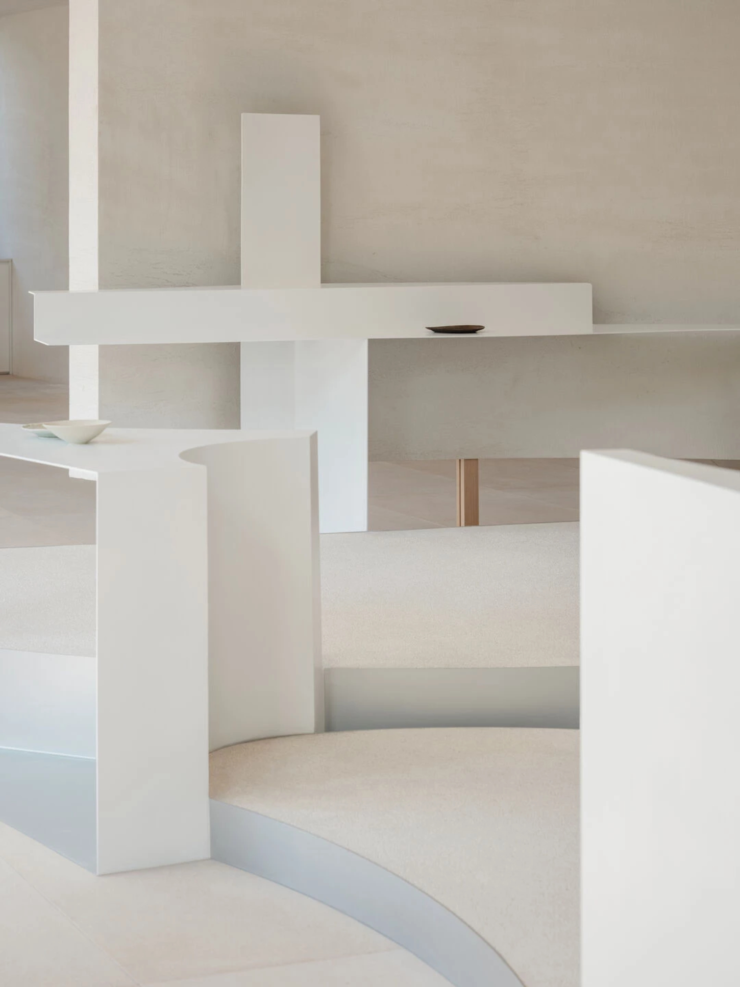 JIA Garden by Mountain Soil — A minimalist interior display featuring a white sculptural installation with geometric and organic forms.