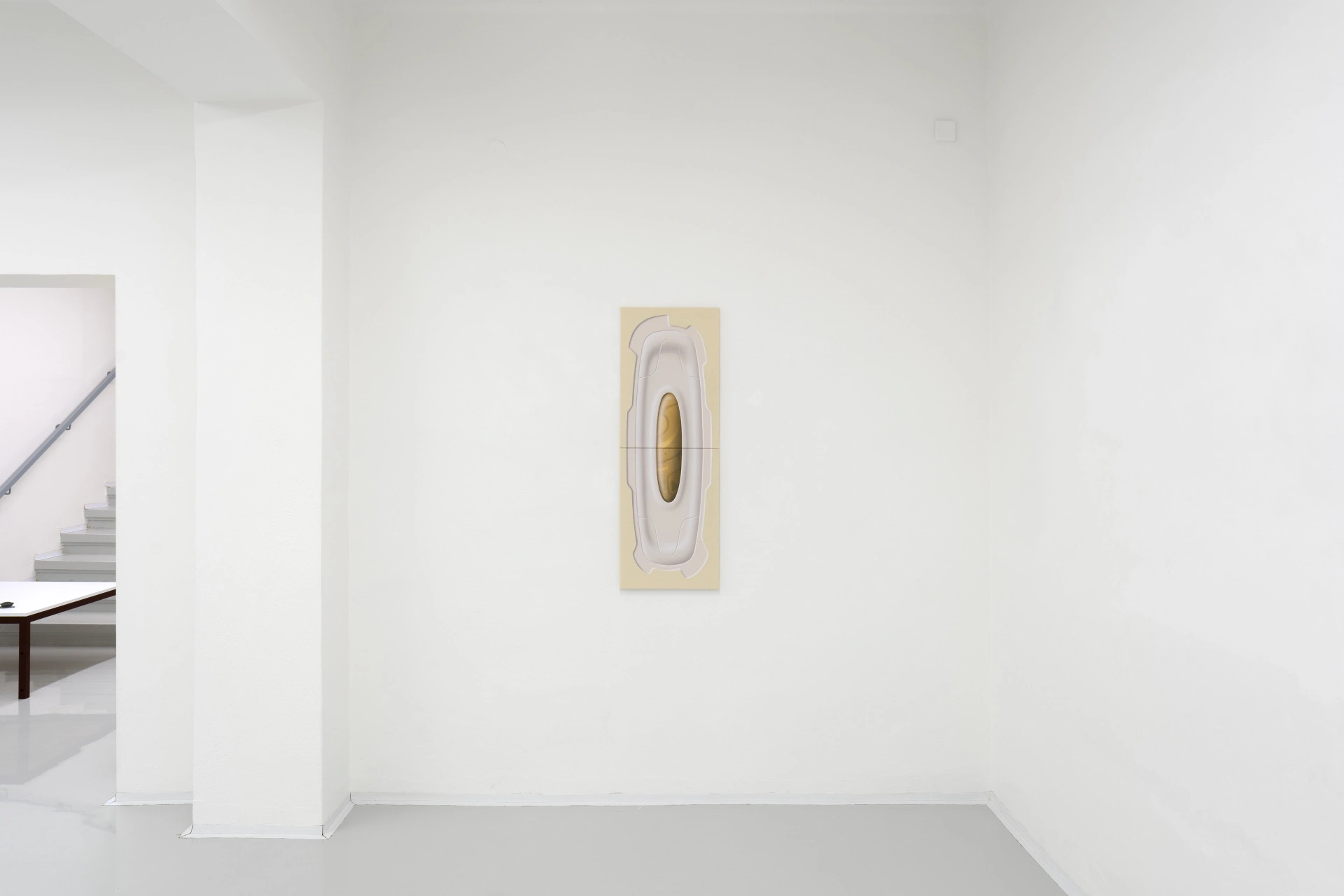 [face_not_recognized] by Milan Vagač — A vertical canvas mounted centrally on a white gallery wall depicts an abstracted vehicle form rendered in cream and mauve tones.