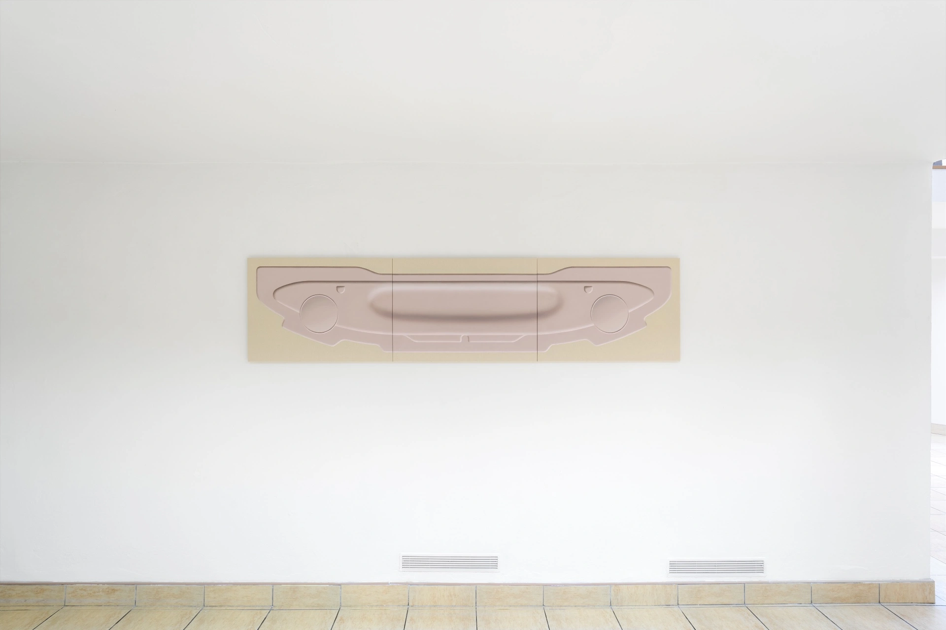 [face_not_recognized] by Milan Vagač — A molded relief depicting an abstracted automobile rendered as a featureless silhouette occupies a three-part composition mounted on pale cream-colored panels.
