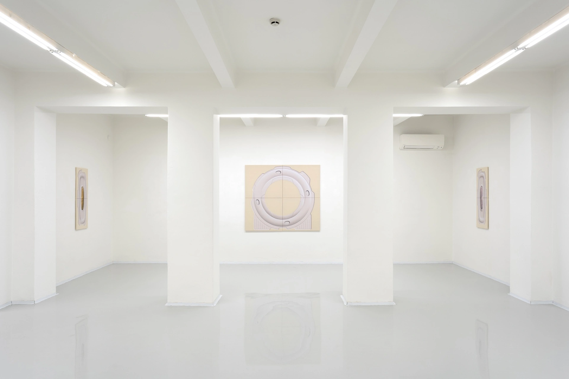 [face_not_recognized] by Milan Vagač — A minimalist gallery installation presents three works across white partition walls under fluorescent ceiling lights.