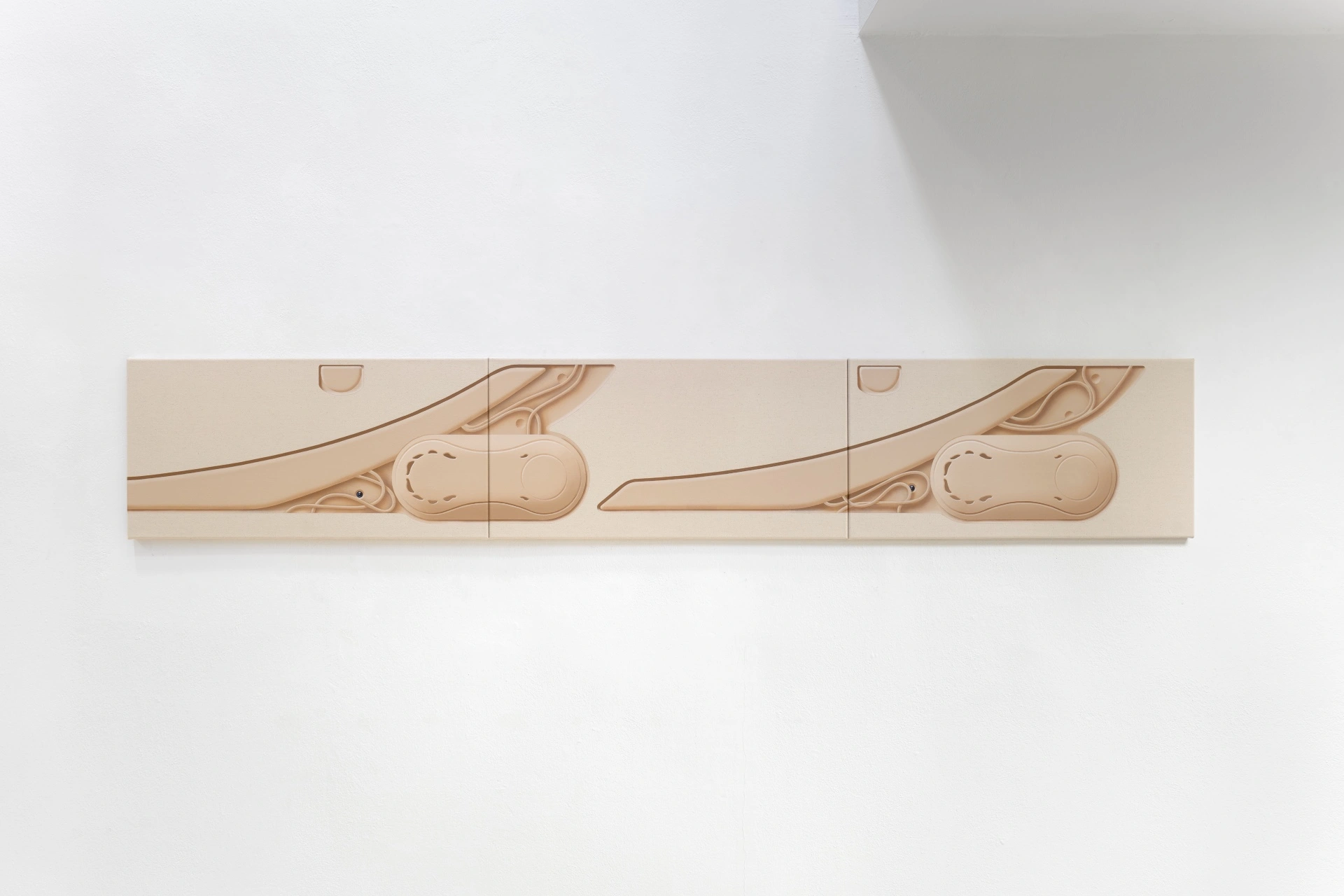 [face_not_recognized] by Milan Vagač — A horizontal wooden relief carved with paired abstracted vehicle profiles, divided into two mirrored sections by central joints.