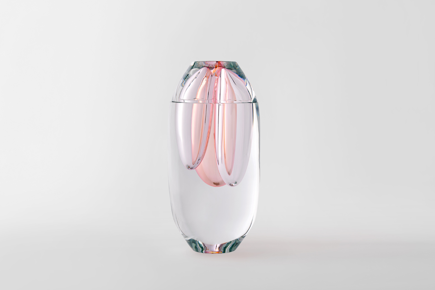 Selected works by Philipp Weber — A hand-blown glass vessel with organic, fluid surface patterns in pale pink and clear tones, suspended vertically against a neutral background.
