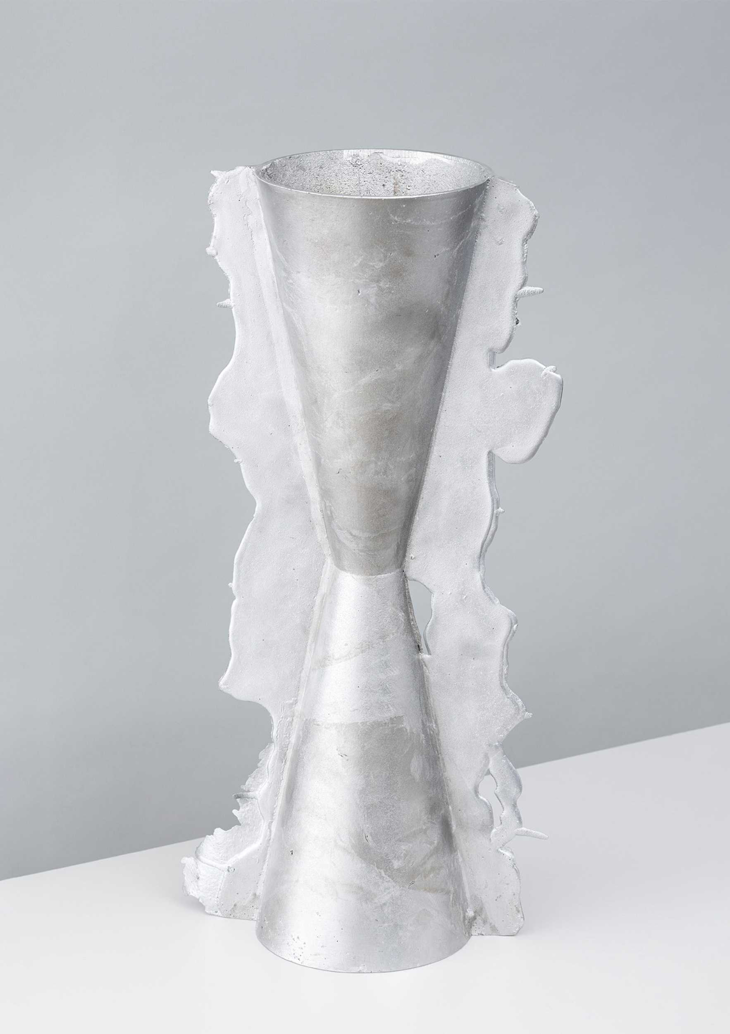 Vessels of Imperfection by Anna Zimmermann — A single cast aluminum vessel from Zimmermann's series, captured in frontal view.