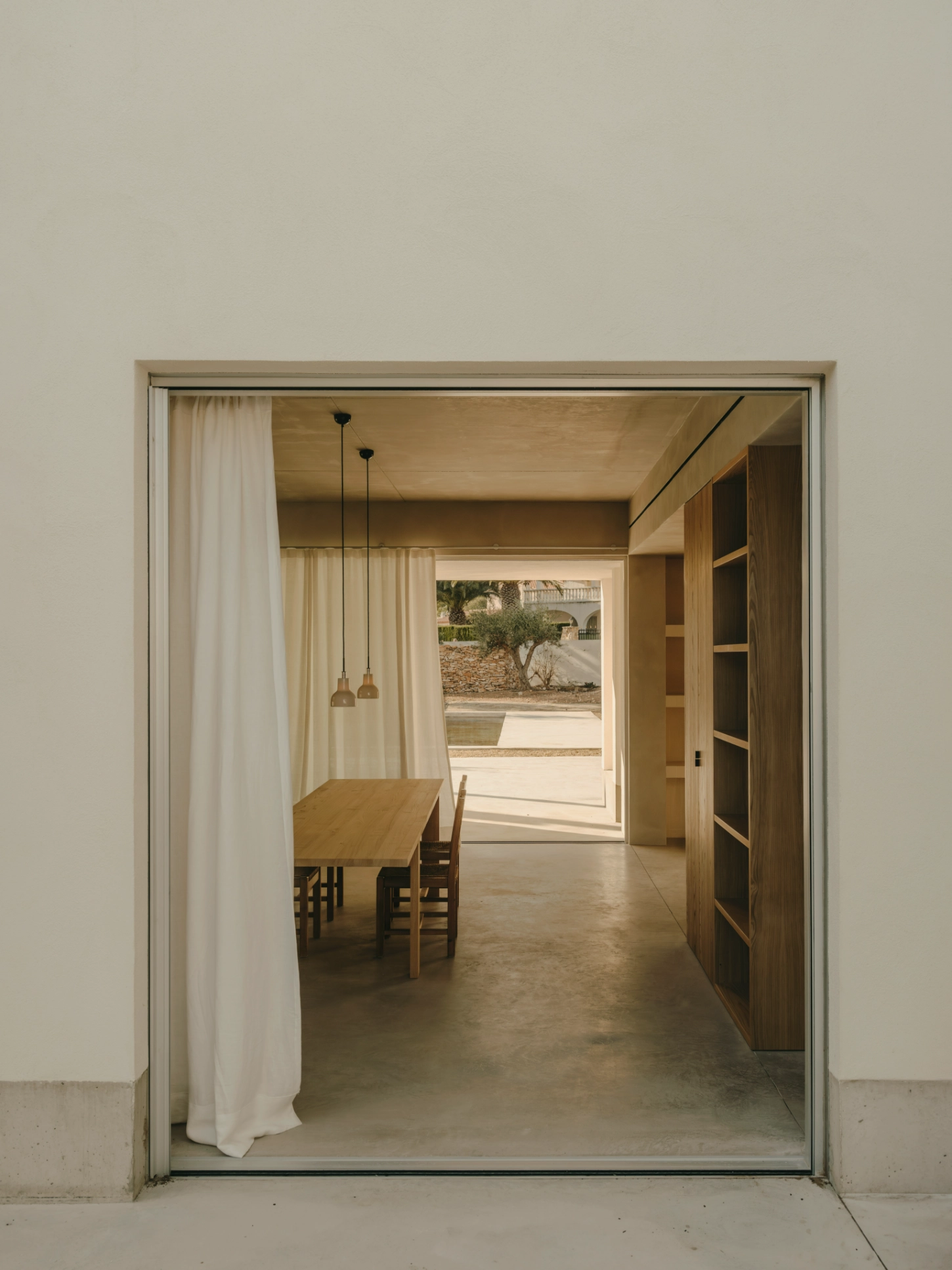 Casa TD by Skye Maunsell, Jordi Veciana and Juan Gurrea Rumeu — A framed threshold articulates the interior-exterior boundary of Casa TD.