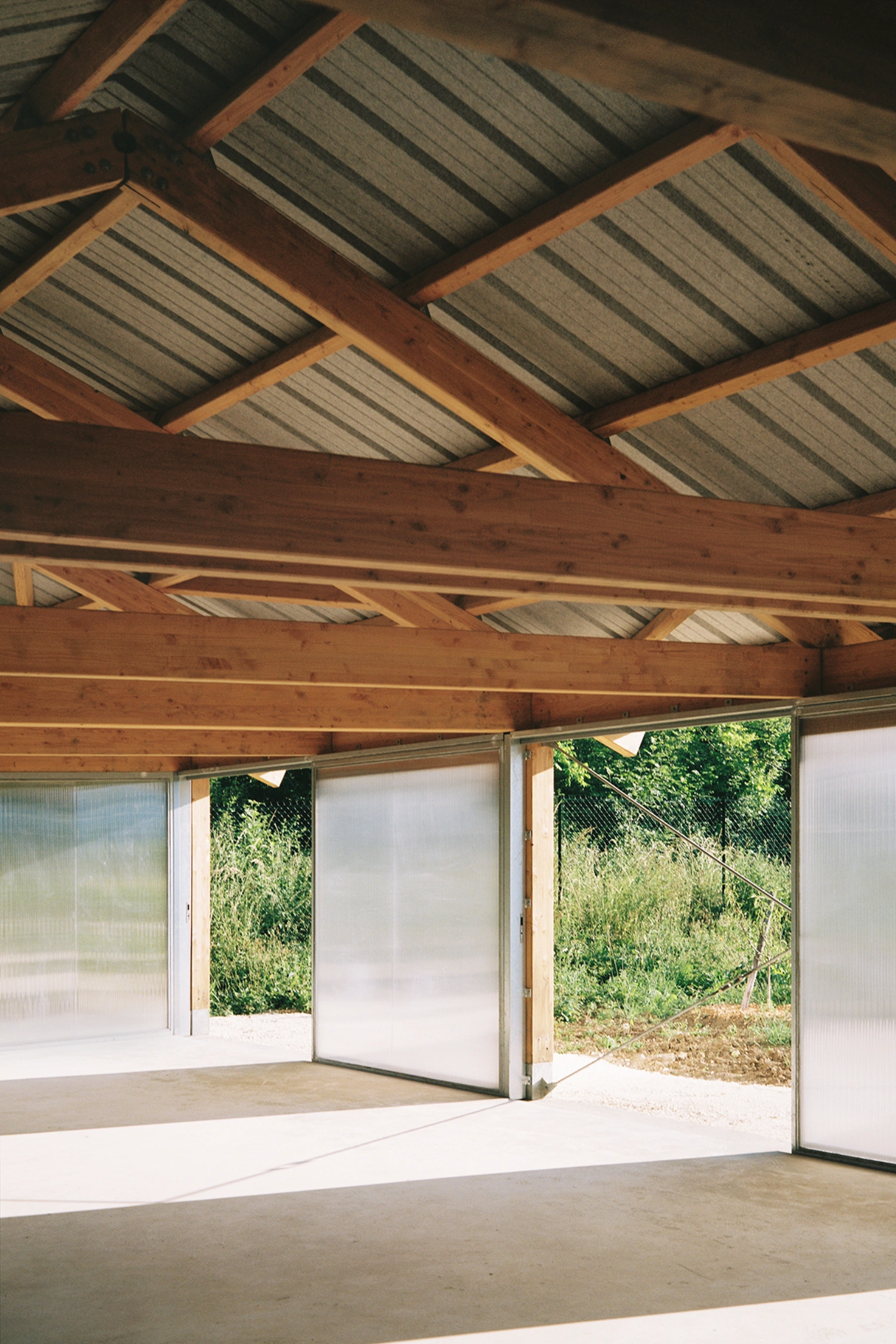 Garden Pavilion by Esnard Sanz Architectes — Interior view of the Garden Pavilion reveals the clarity of its structural logic.
